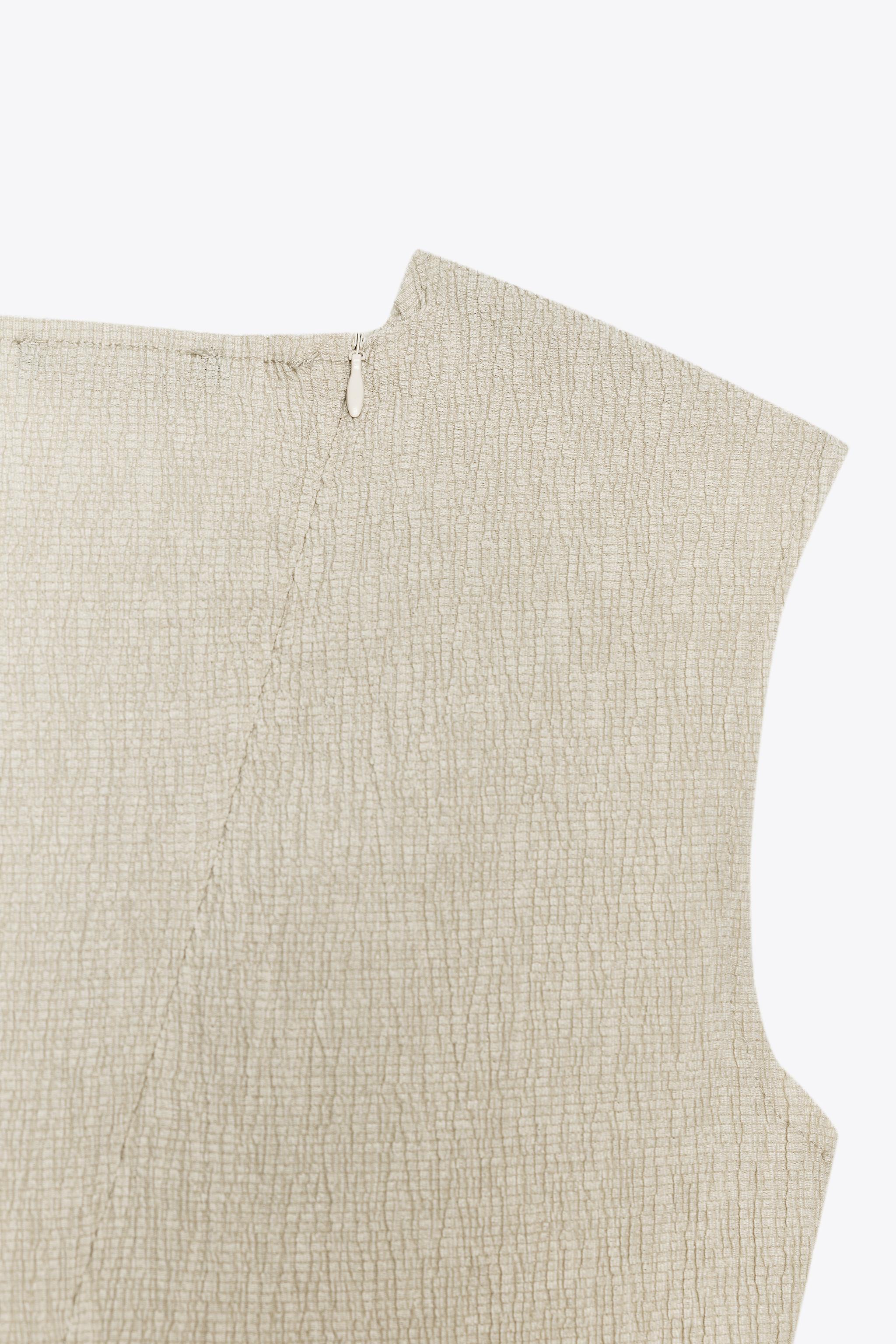 ASYMMETRIC TEXTURED TOP