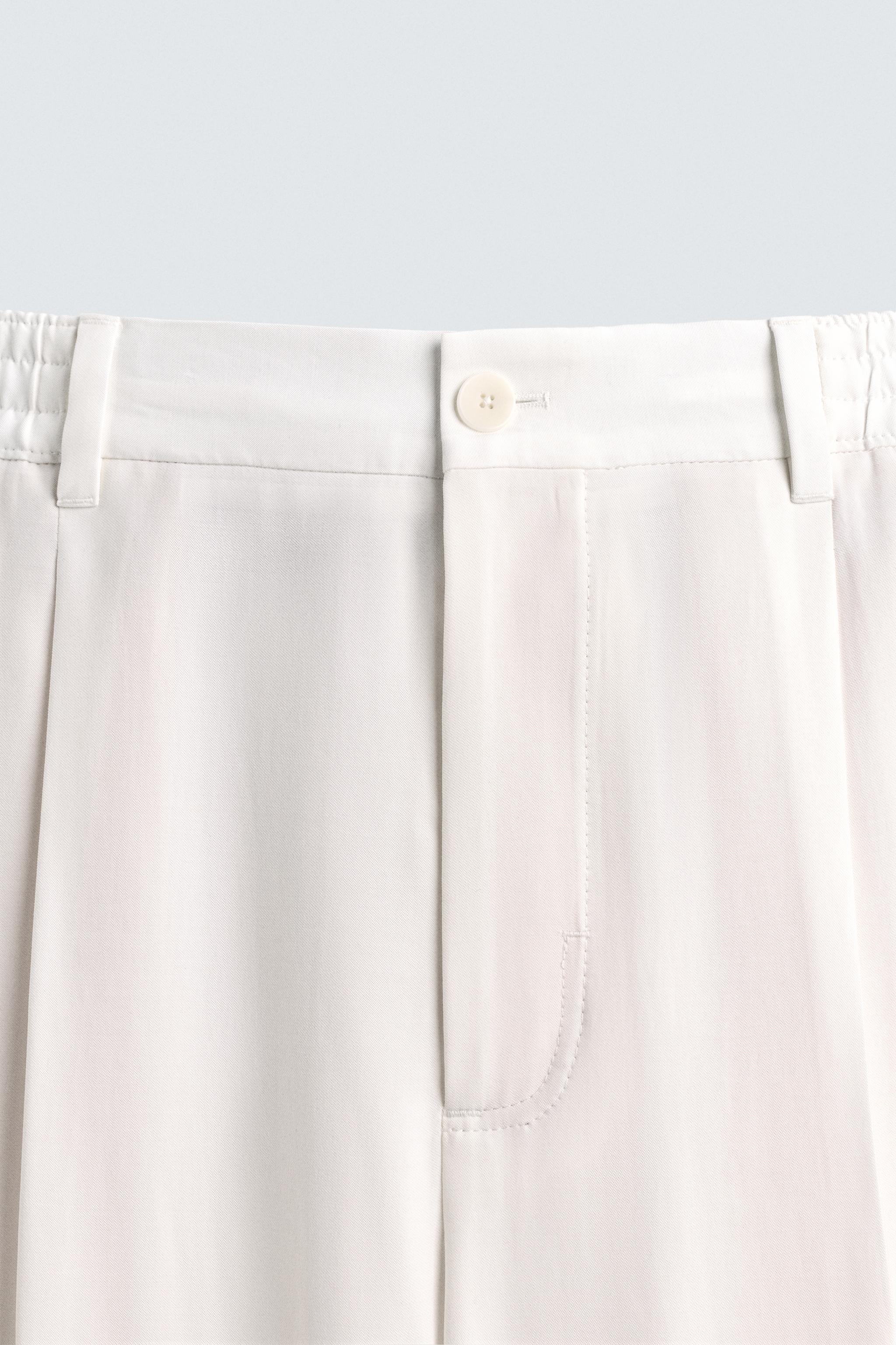 RELAXED FIT PLEATED PANTS