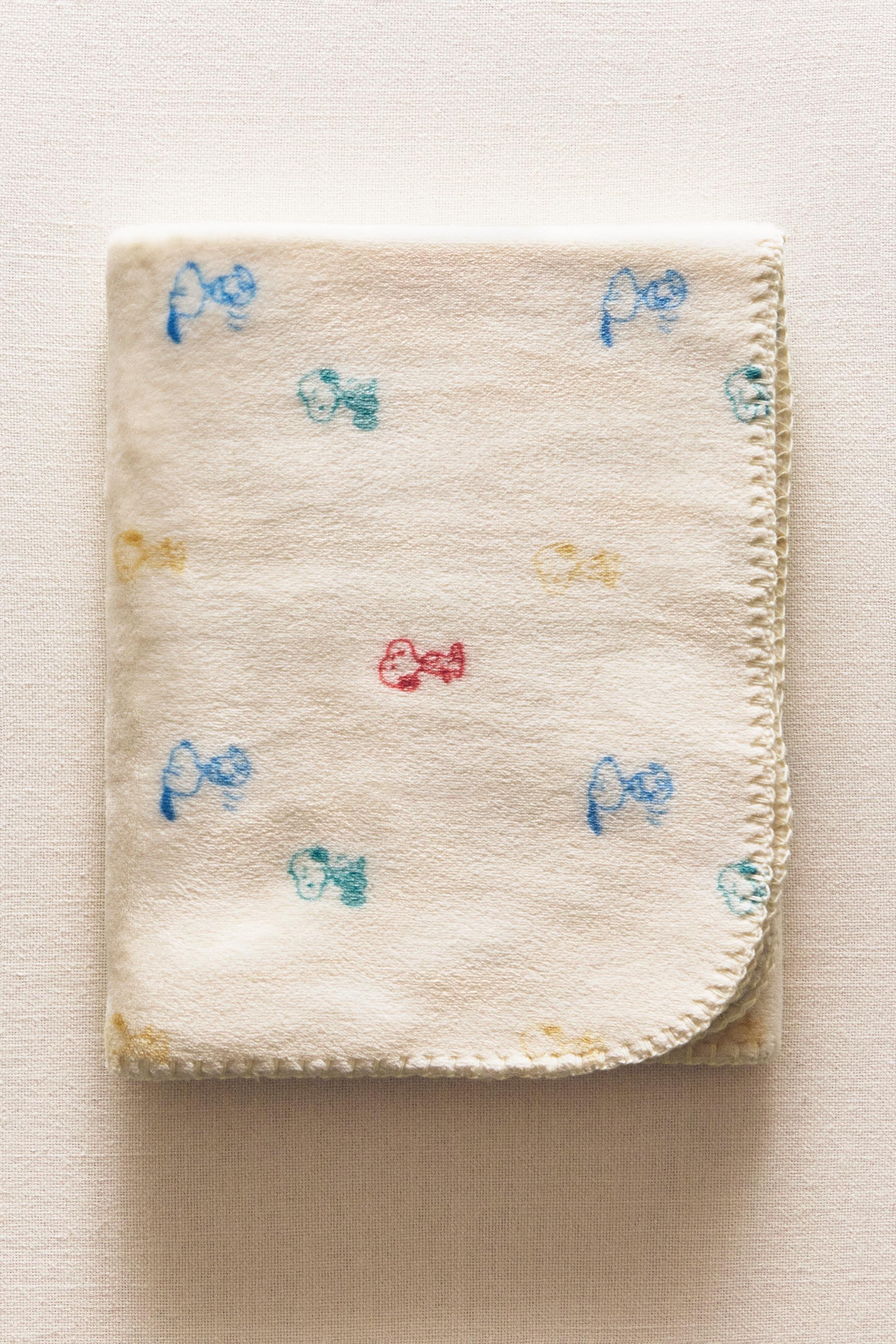 PEANUTS™ CHILDREN’S FLEECE BLANKET