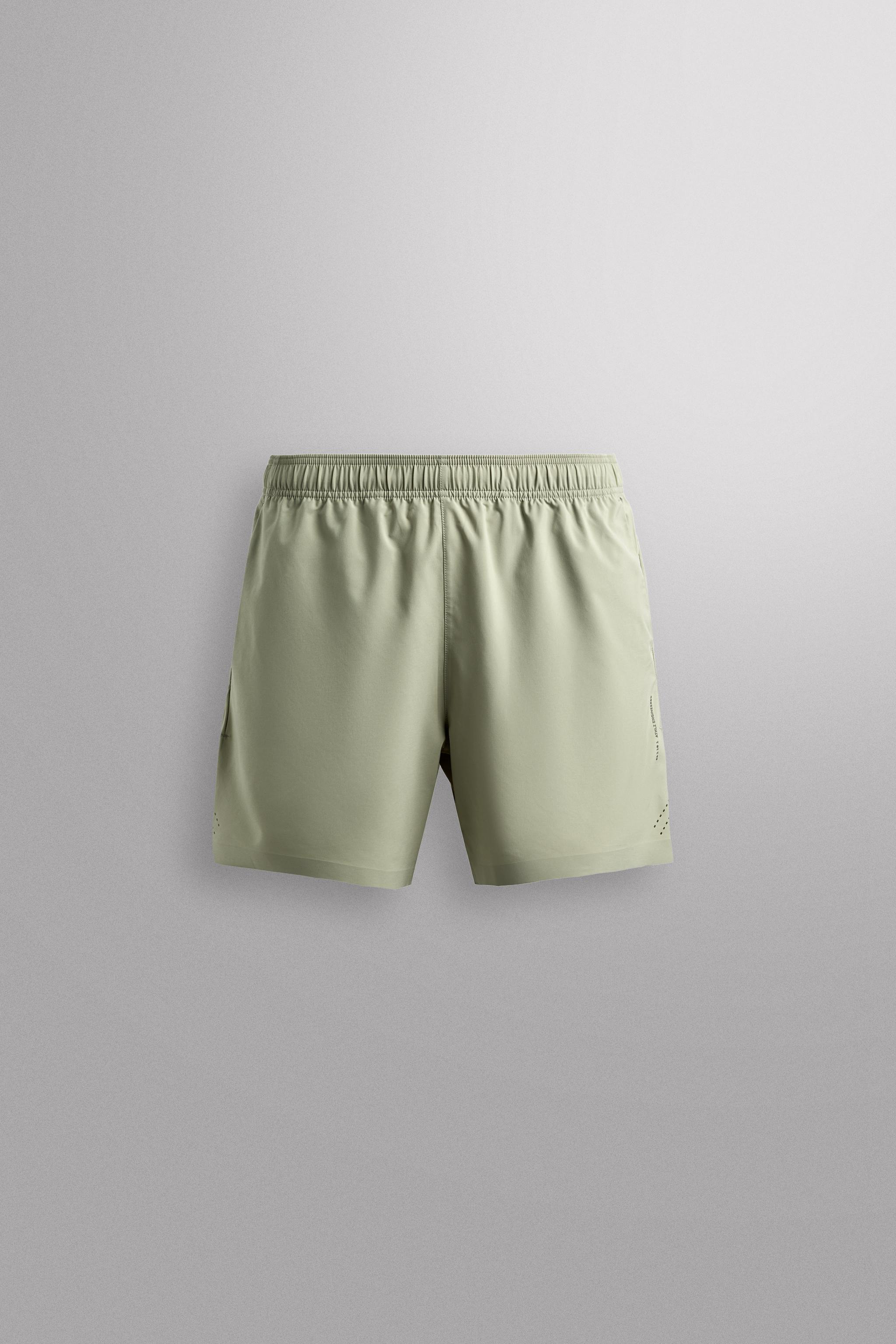 LIGHTWEIGHT PERFORATED SHORTS