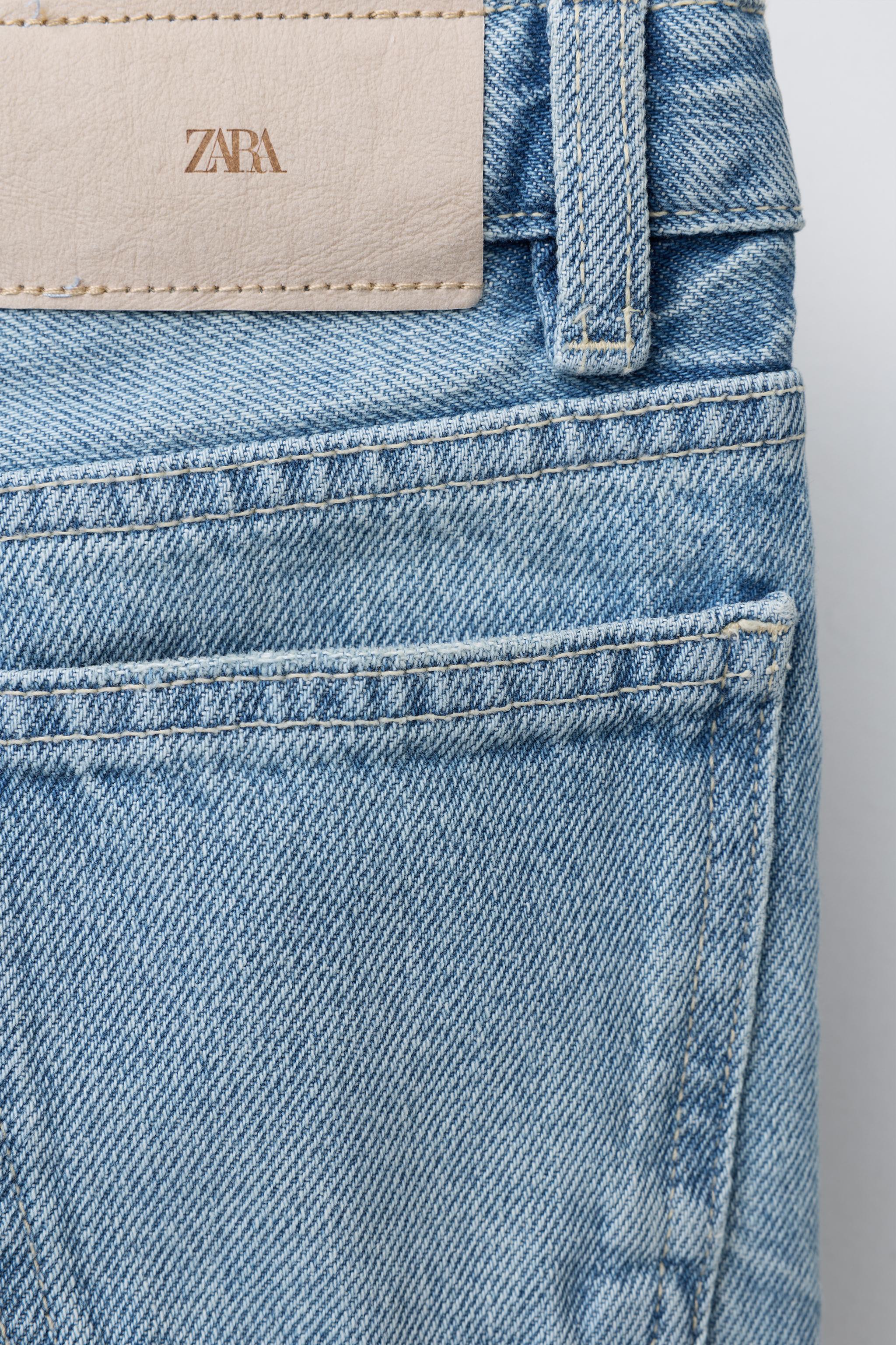 DISTRESSED WIDE LEG JEANS