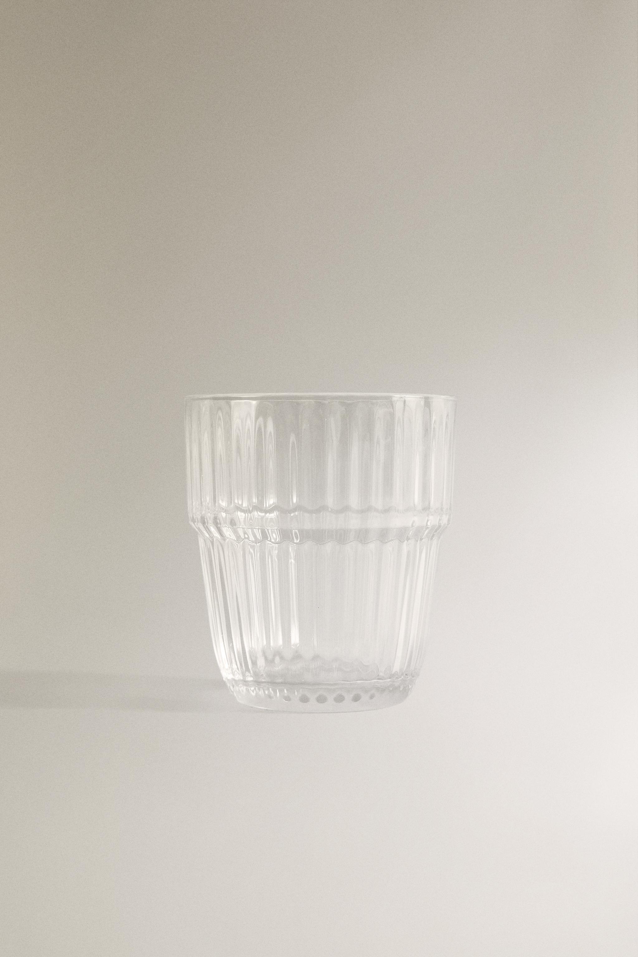 RAISED DESIGN GLASS TUMBLER