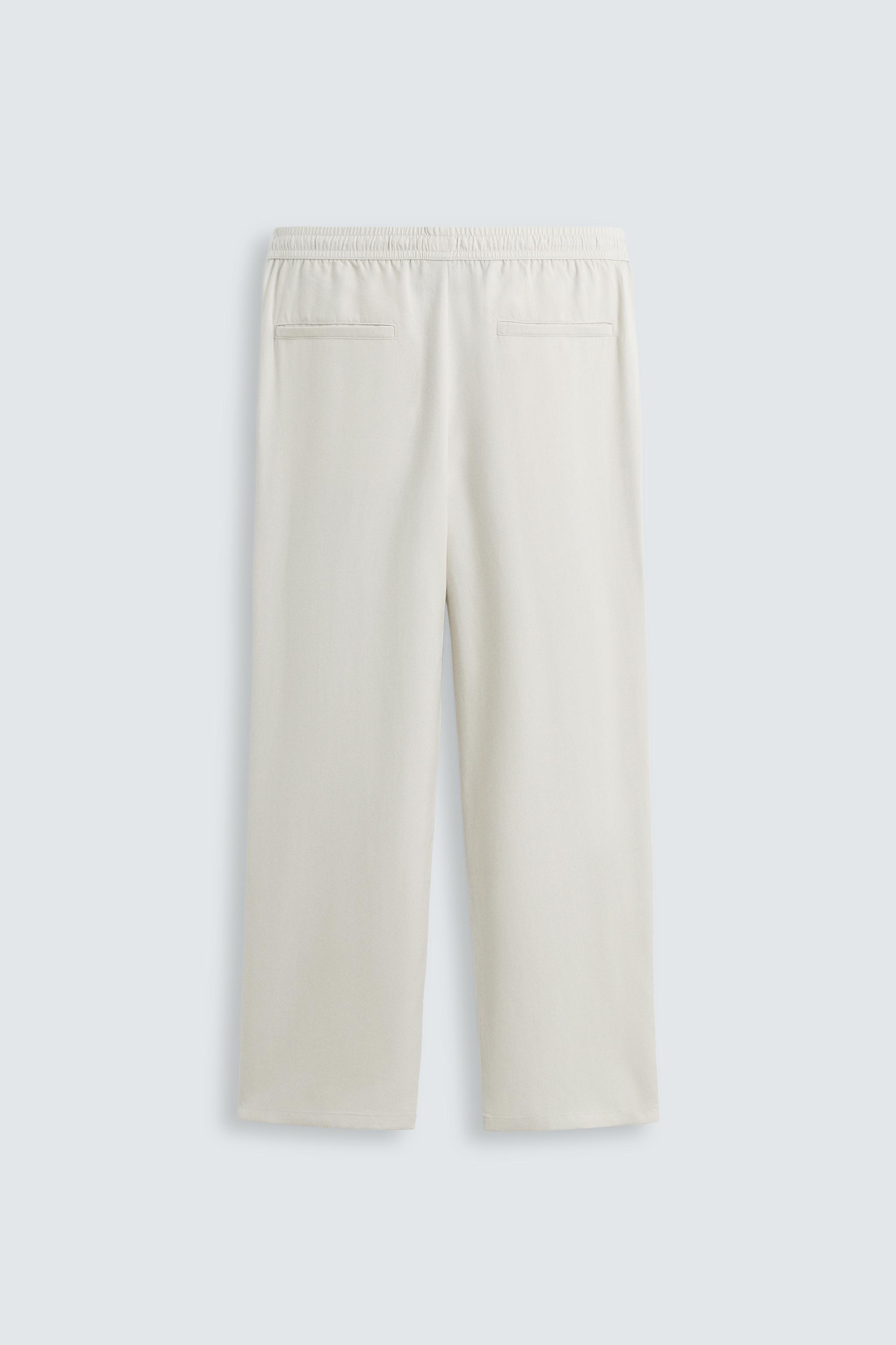 RELAXED FIT FLOWY PANTS