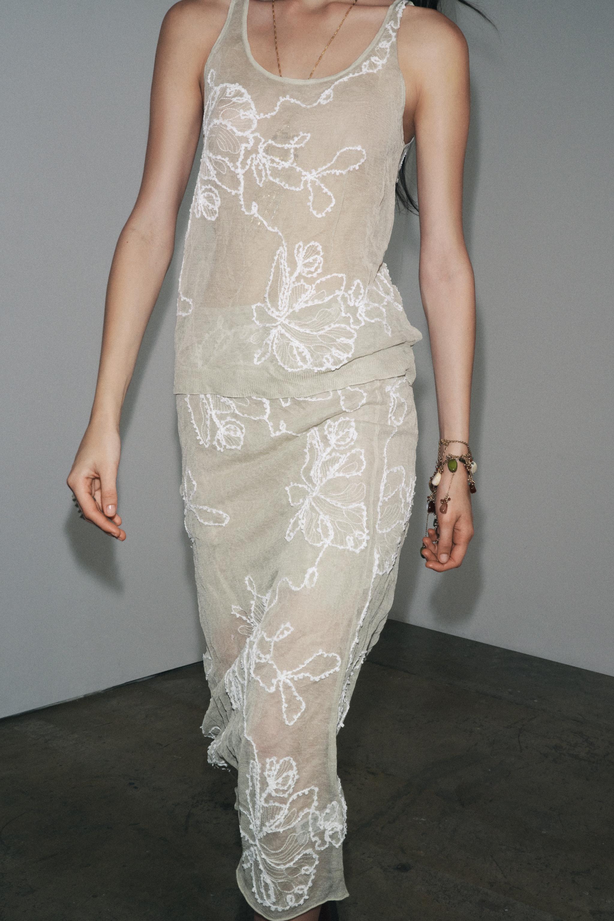 SEMI-SHEER STRUCTURED KNIT SKIRT