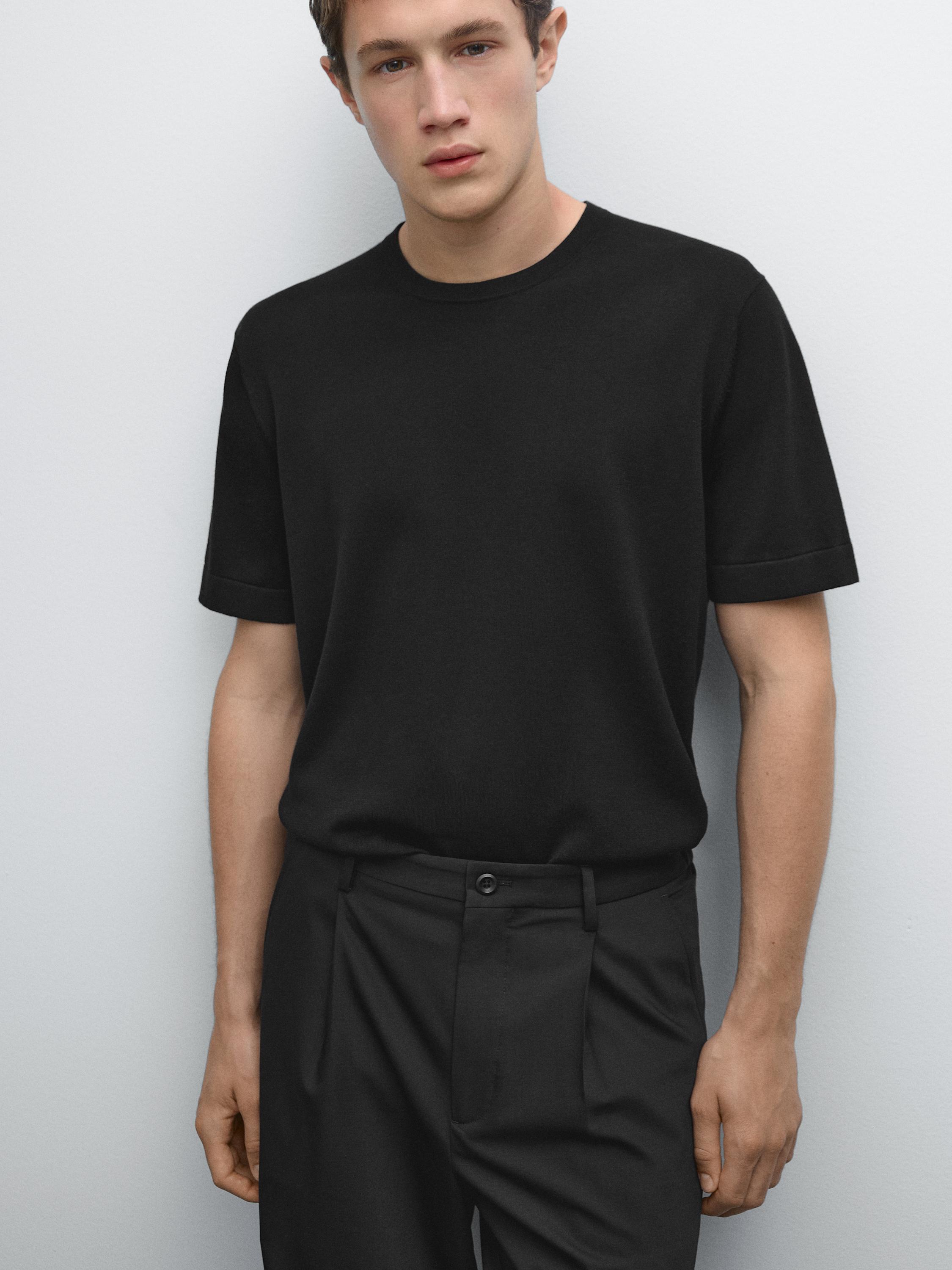 Relaxed fit trousers with darts