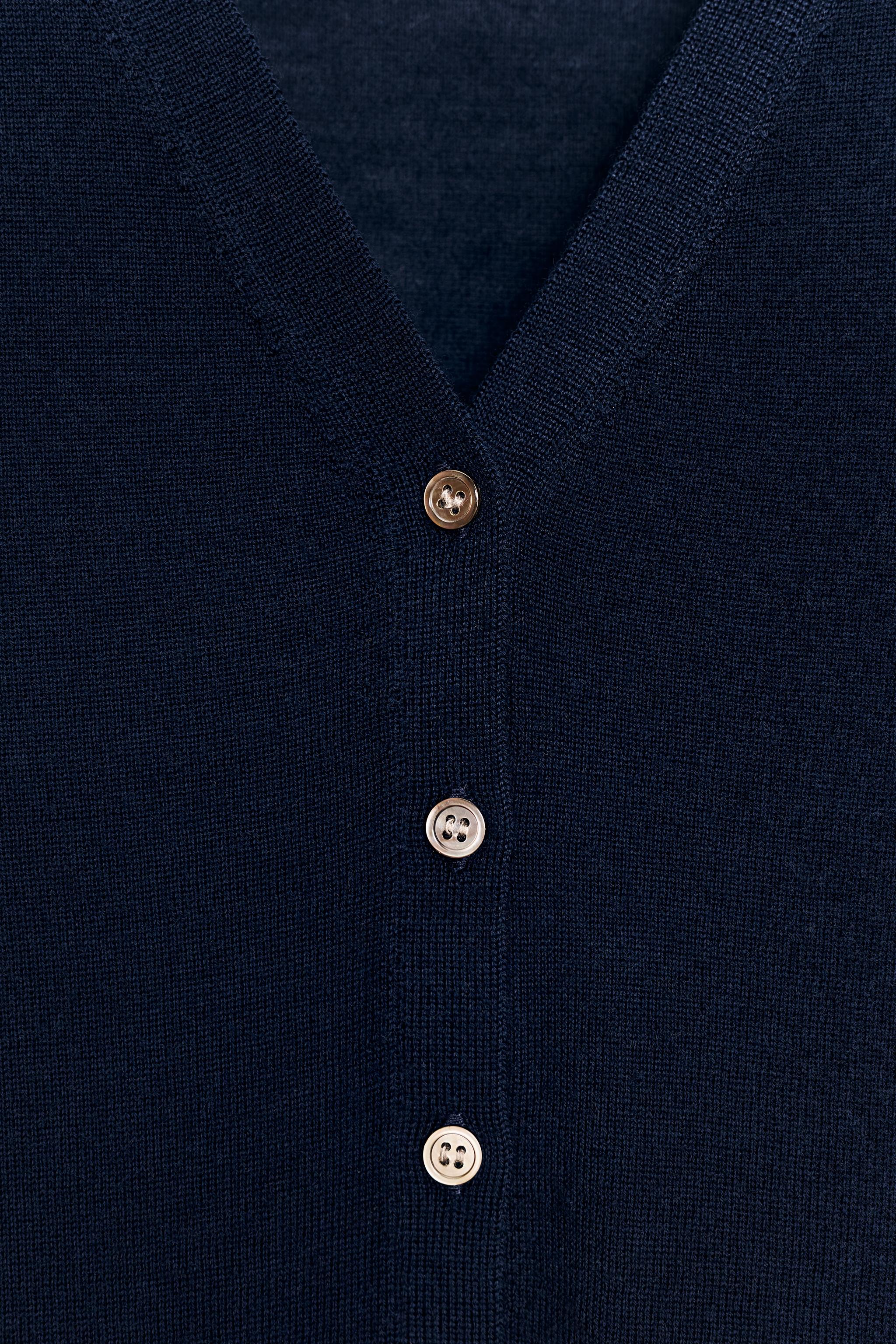 100% EXTRAFINE WOOL SHORT SLEEVE JACKET