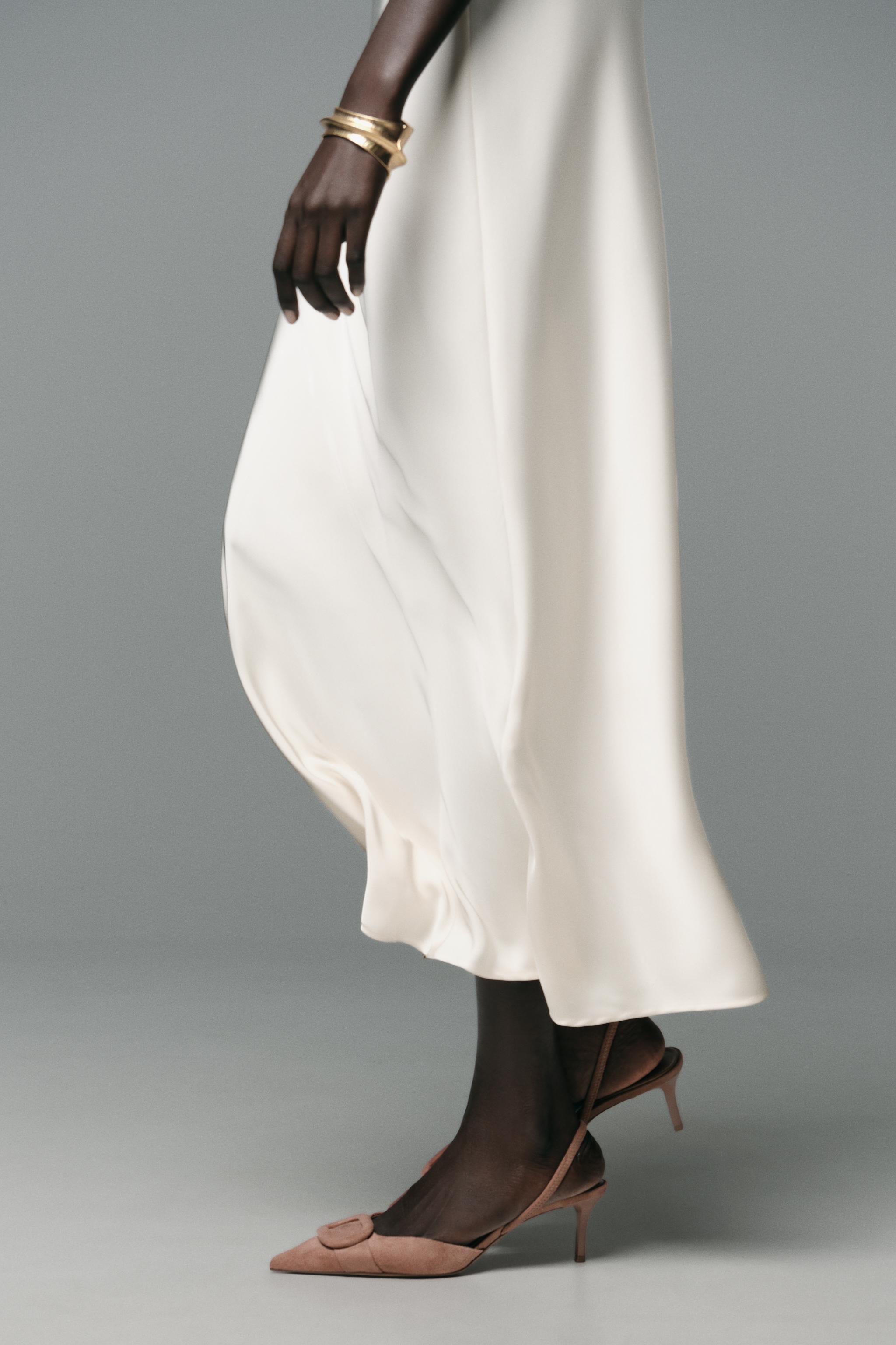 SLINGBACK APPLIQUÉ HEELS