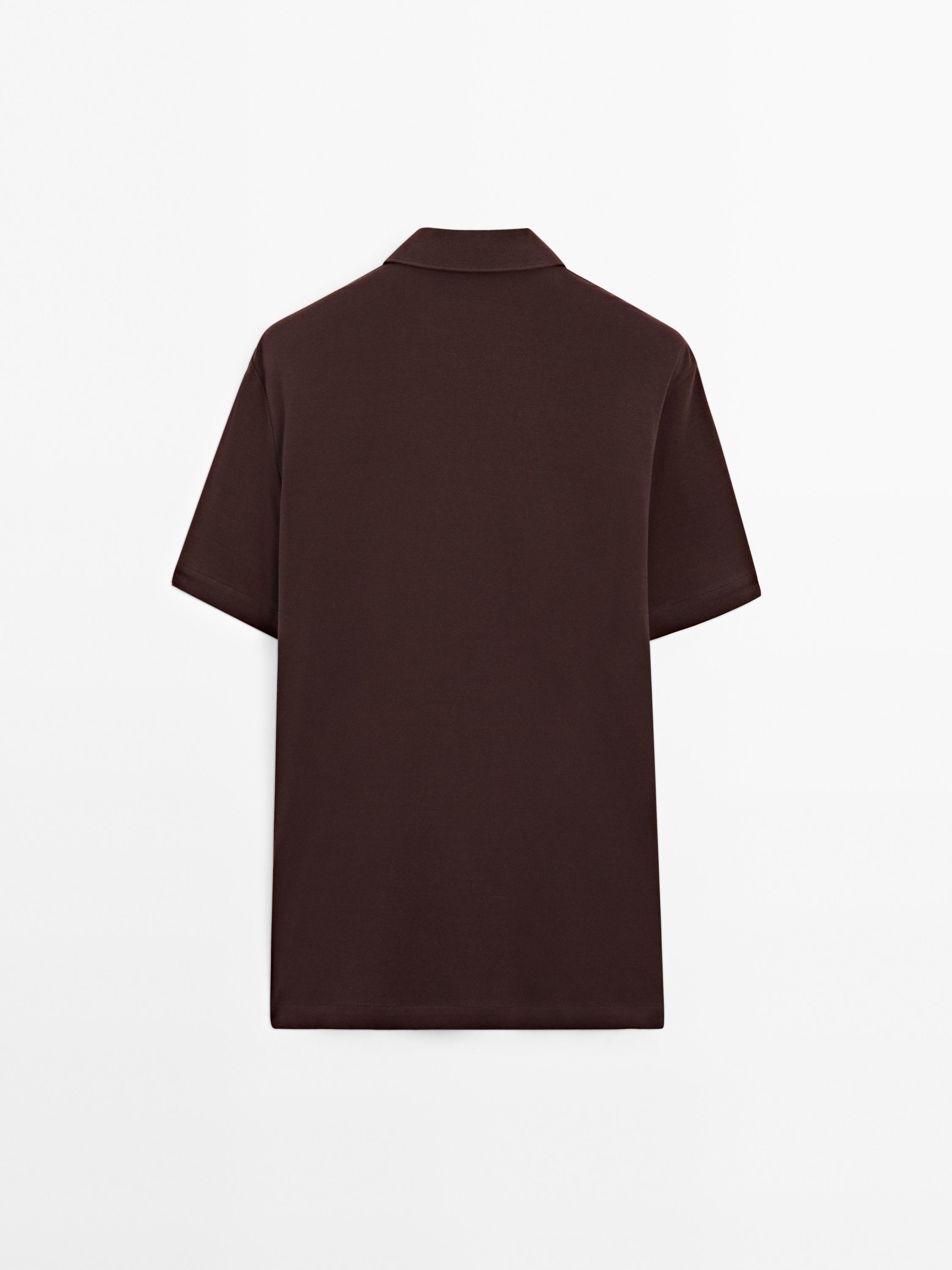 Short sleeve polo shirt with snap-button placket