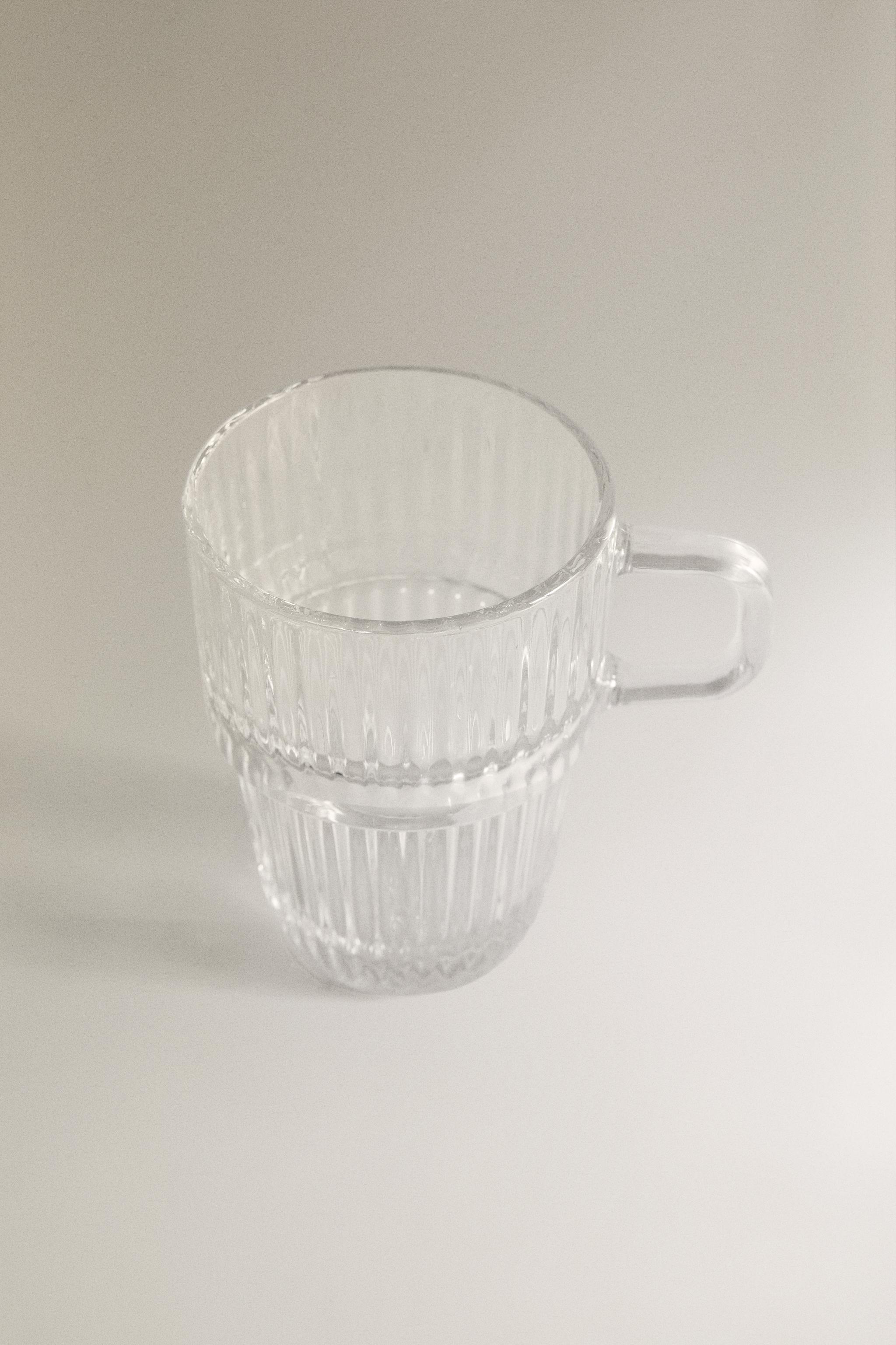 GLASS MUG WITH A RAISED DESIGN
