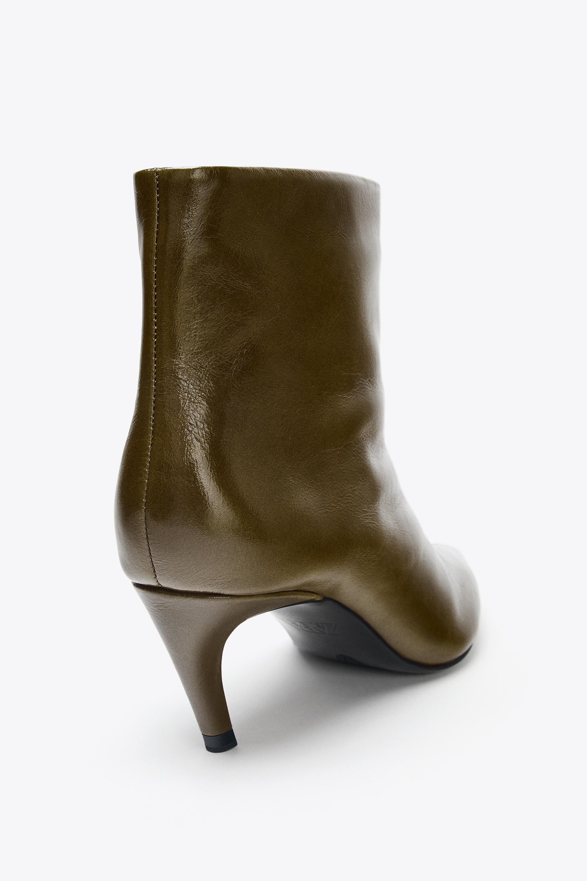 LEATHER CURVED HEEL ANKLE BOOTS