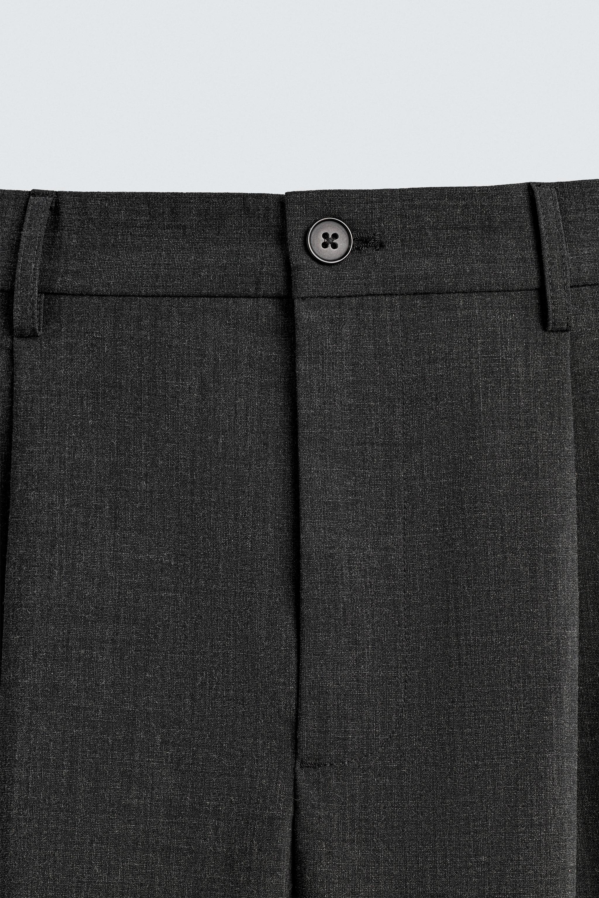 PLEATED WIDE FIT PANTS