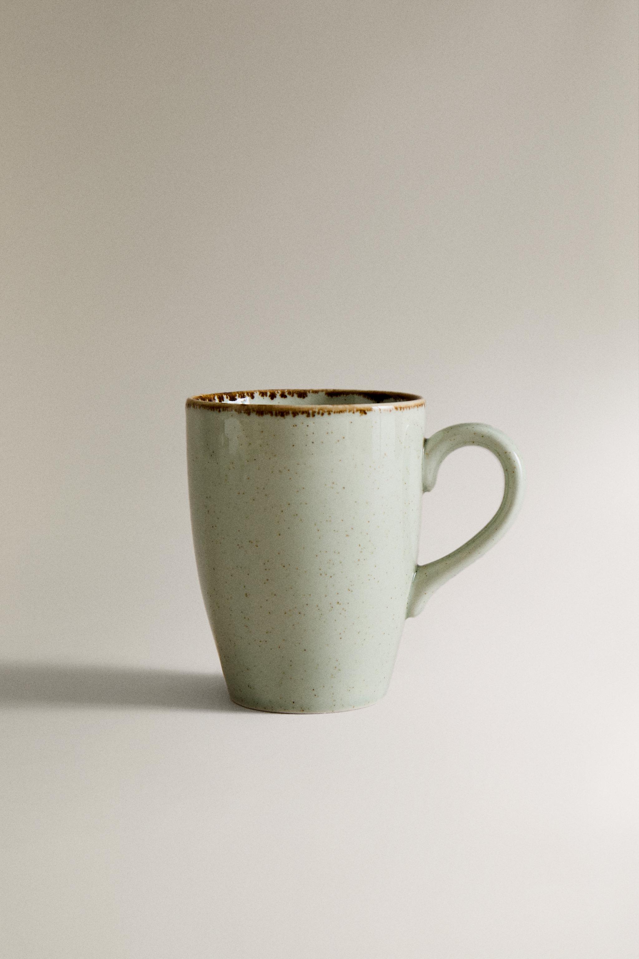 PORCELAIN MUG WITH ANTIQUE FINISH RIM