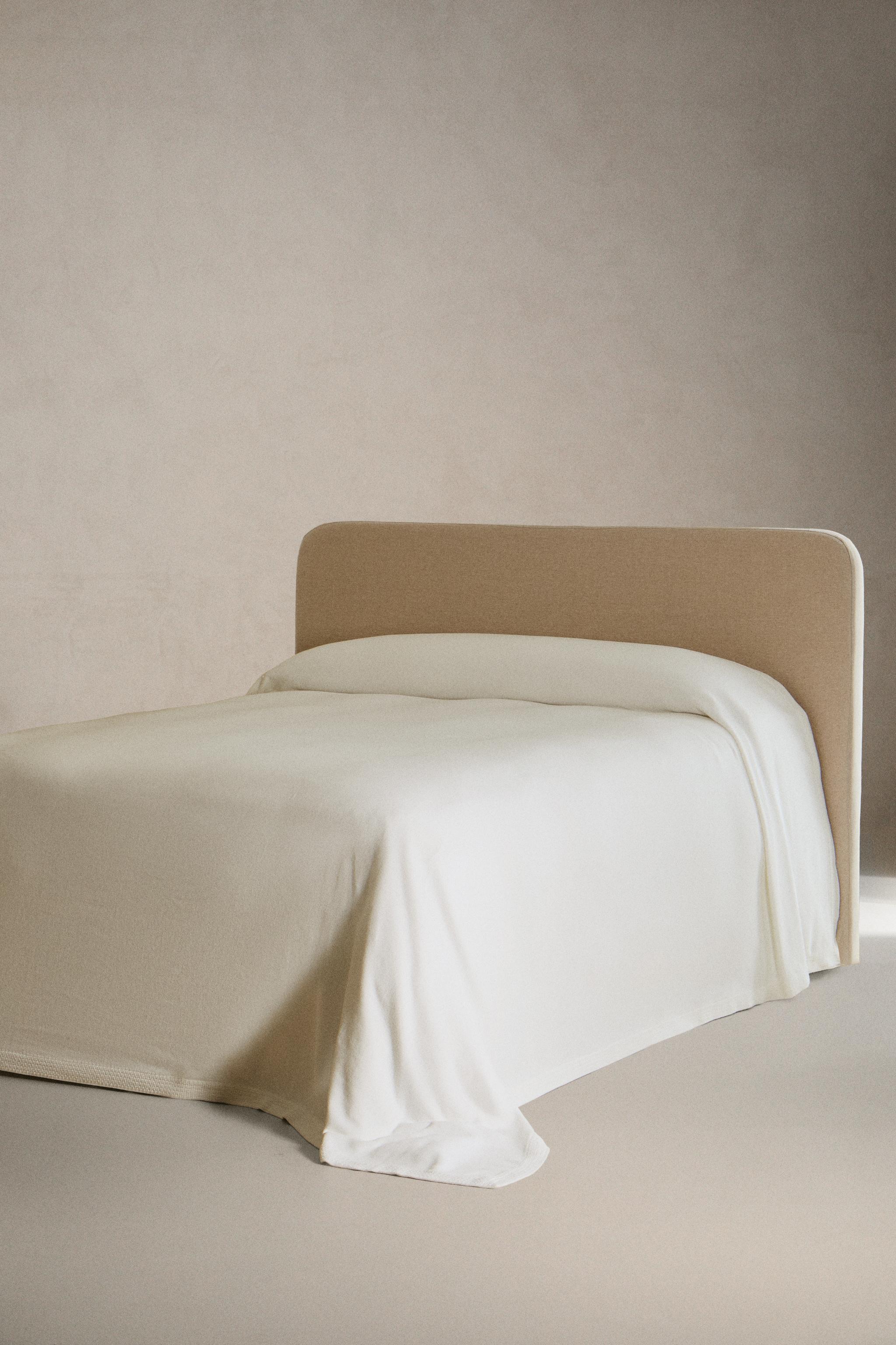 EMBROIDERED BEDSPREAD