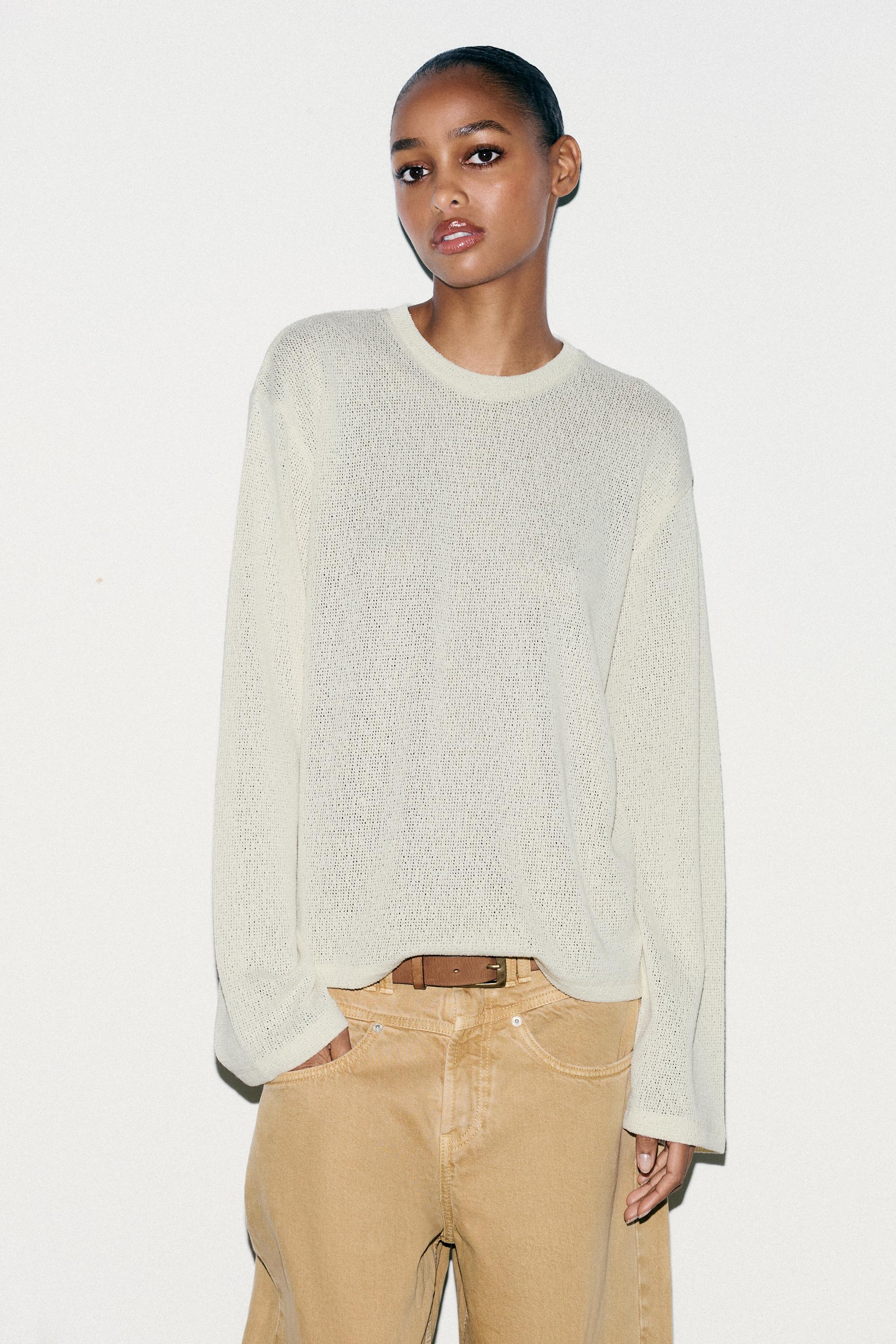 CUT-OUT KNIT SWEATER