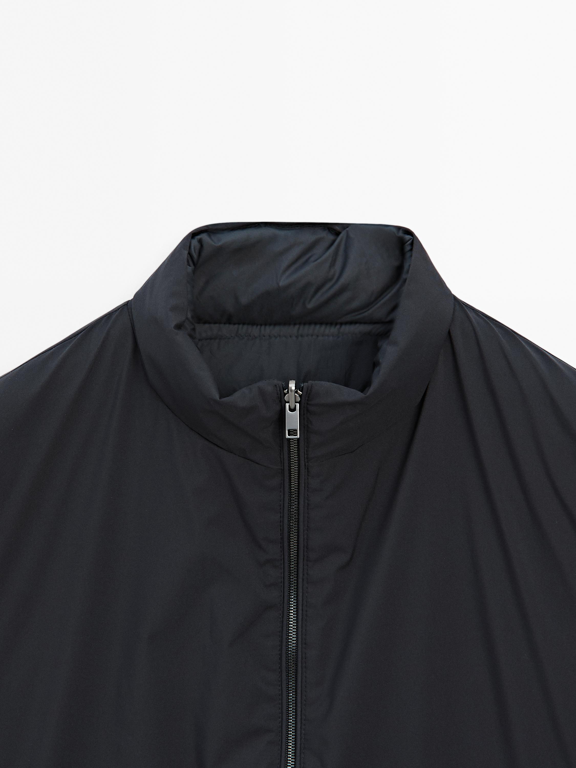 Water-repellent reversible down blend gilet