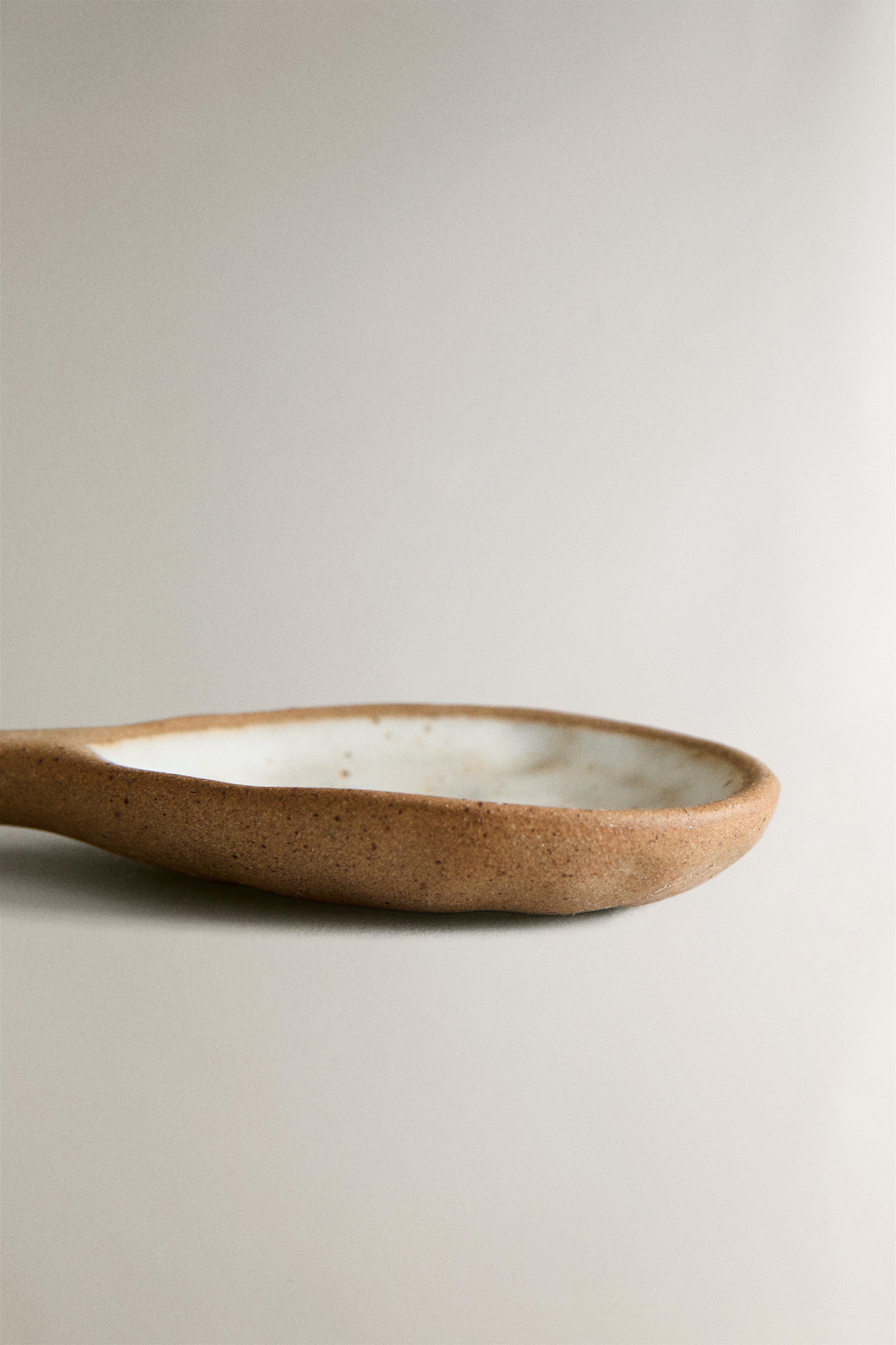 SPOON WITH RAISED DESIGN