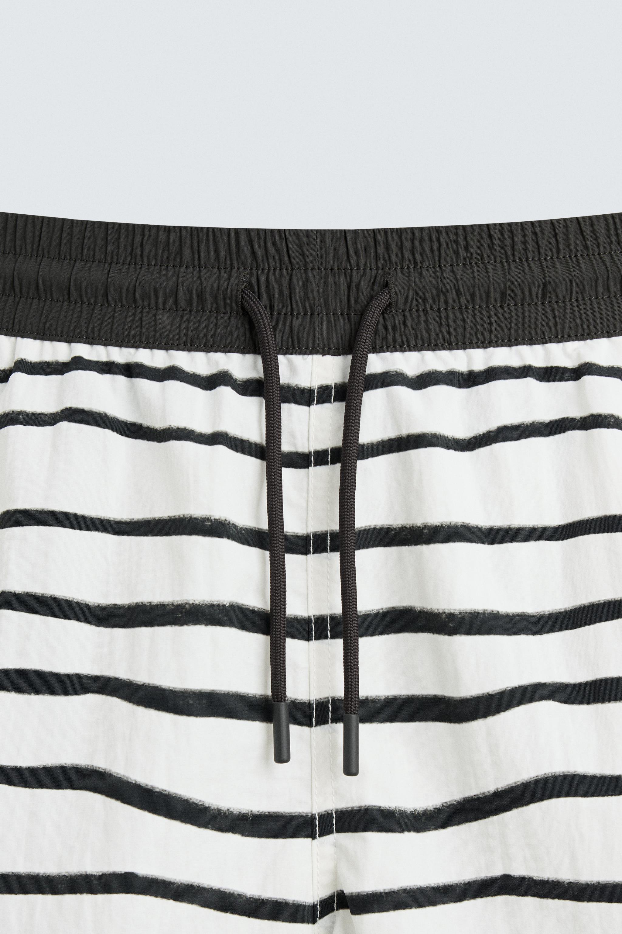 OTIS KWAME KYE QUAICOE PRINTED MID-LENGTH SWIMSUIT