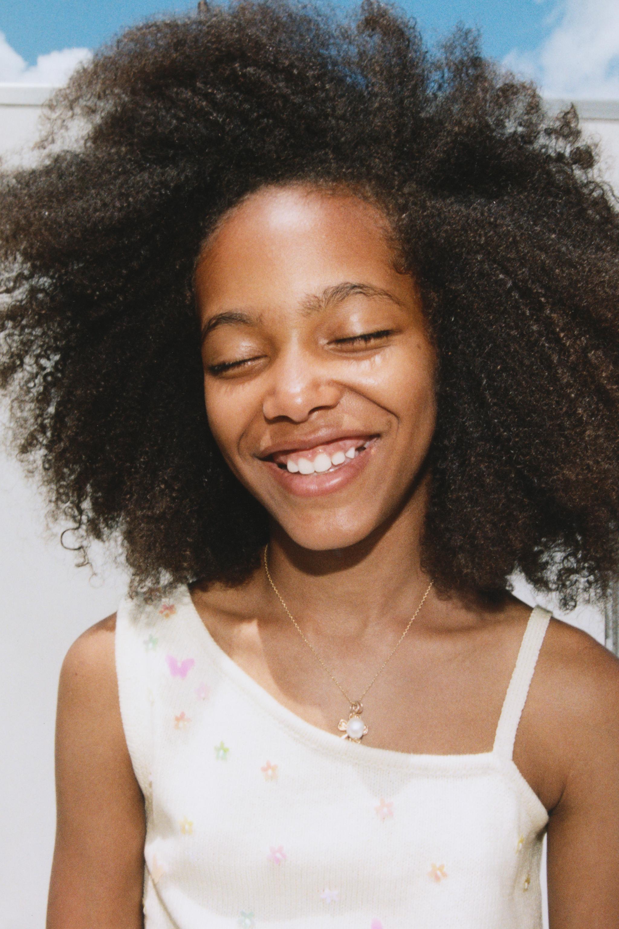 ASYMMETRIC BEADED KNIT TOP