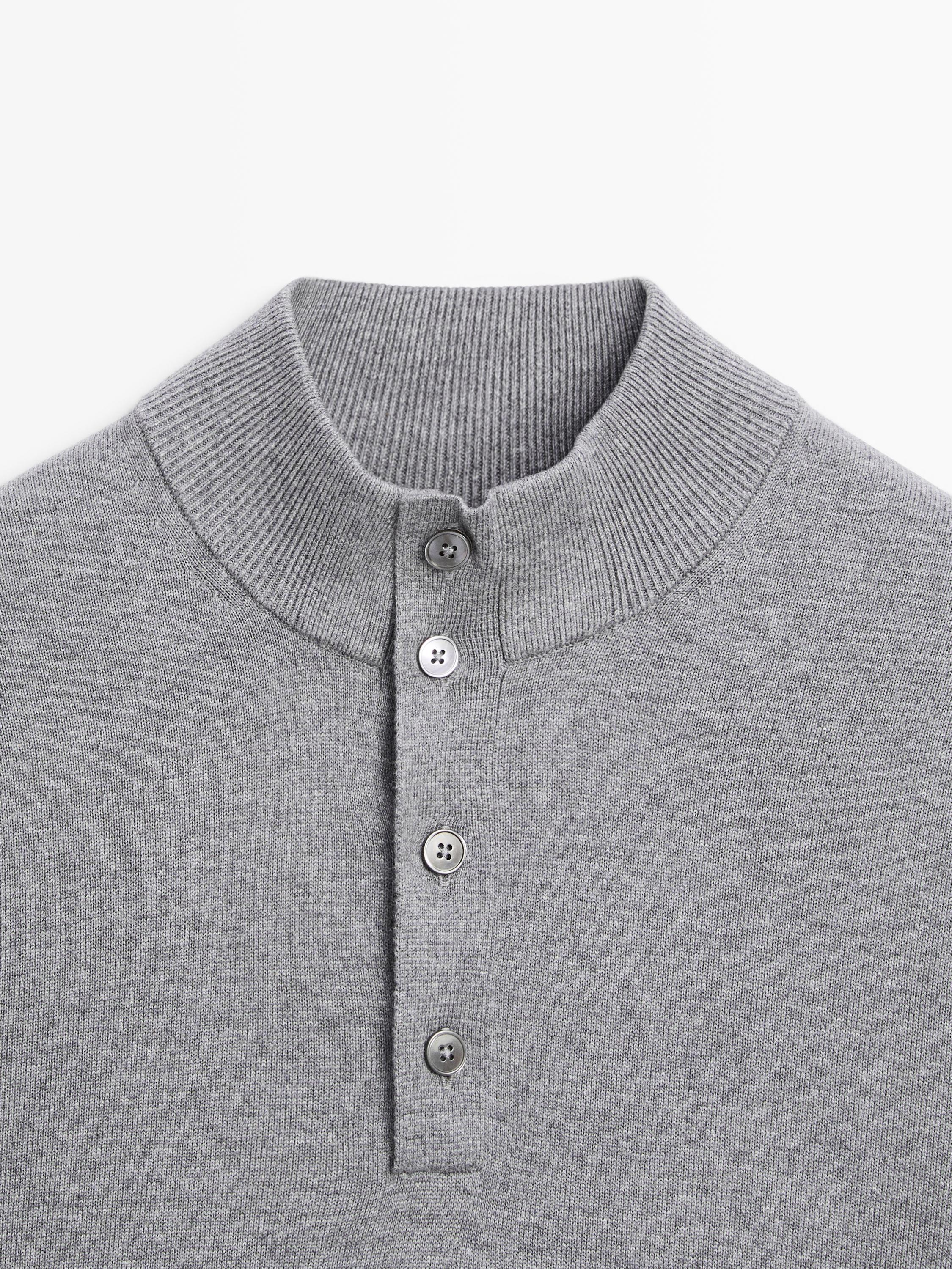 Knit sweater with mock button neck