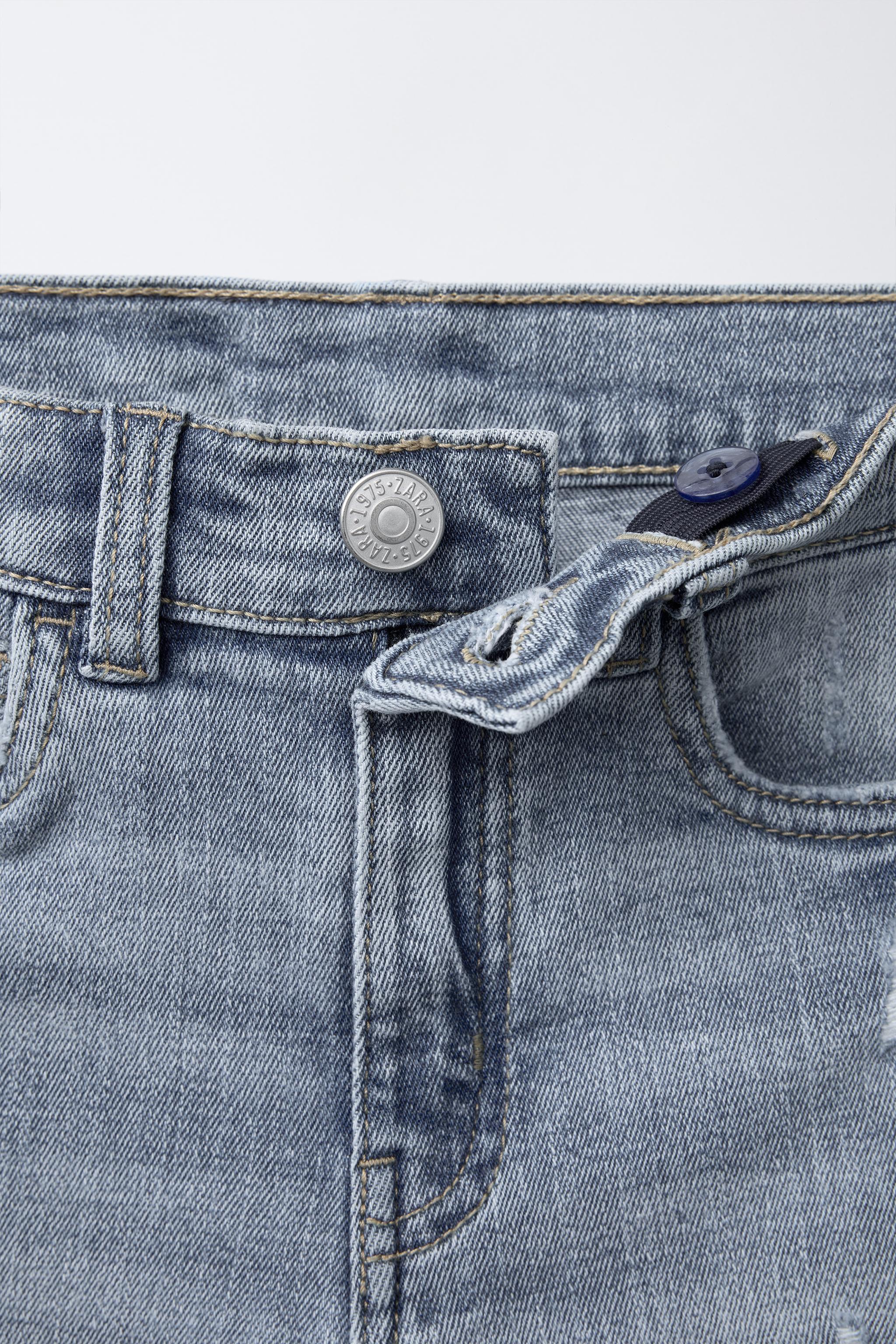 RIPPED SKINNY FIT JEANS