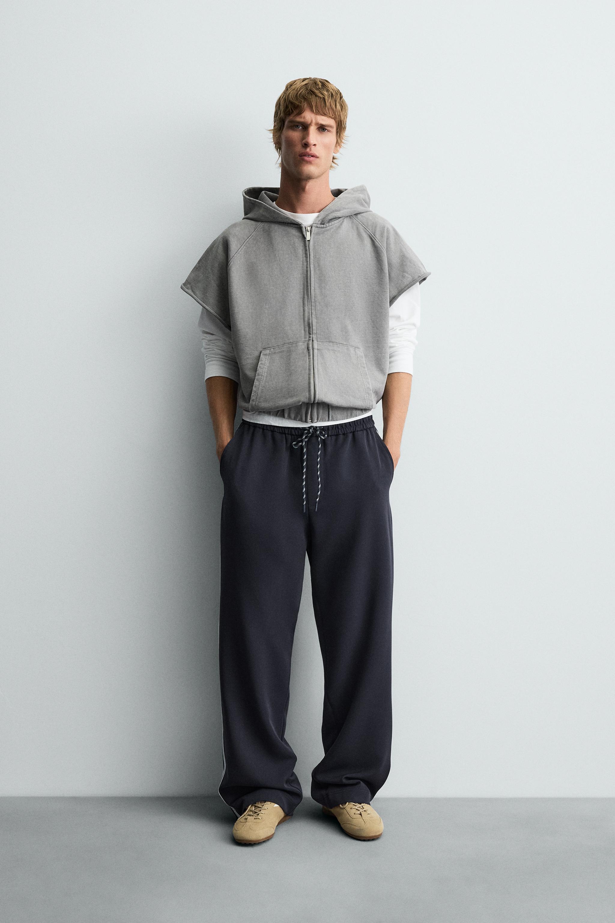 WIDE FIT JOGGER PANTS WITH SIDE STRIPES