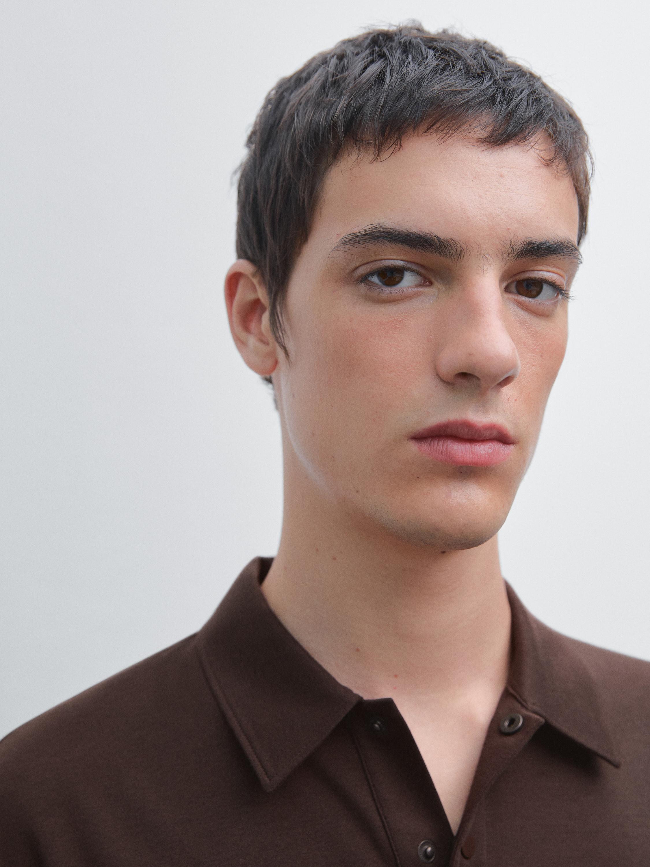 Short sleeve polo shirt with snap-button placket