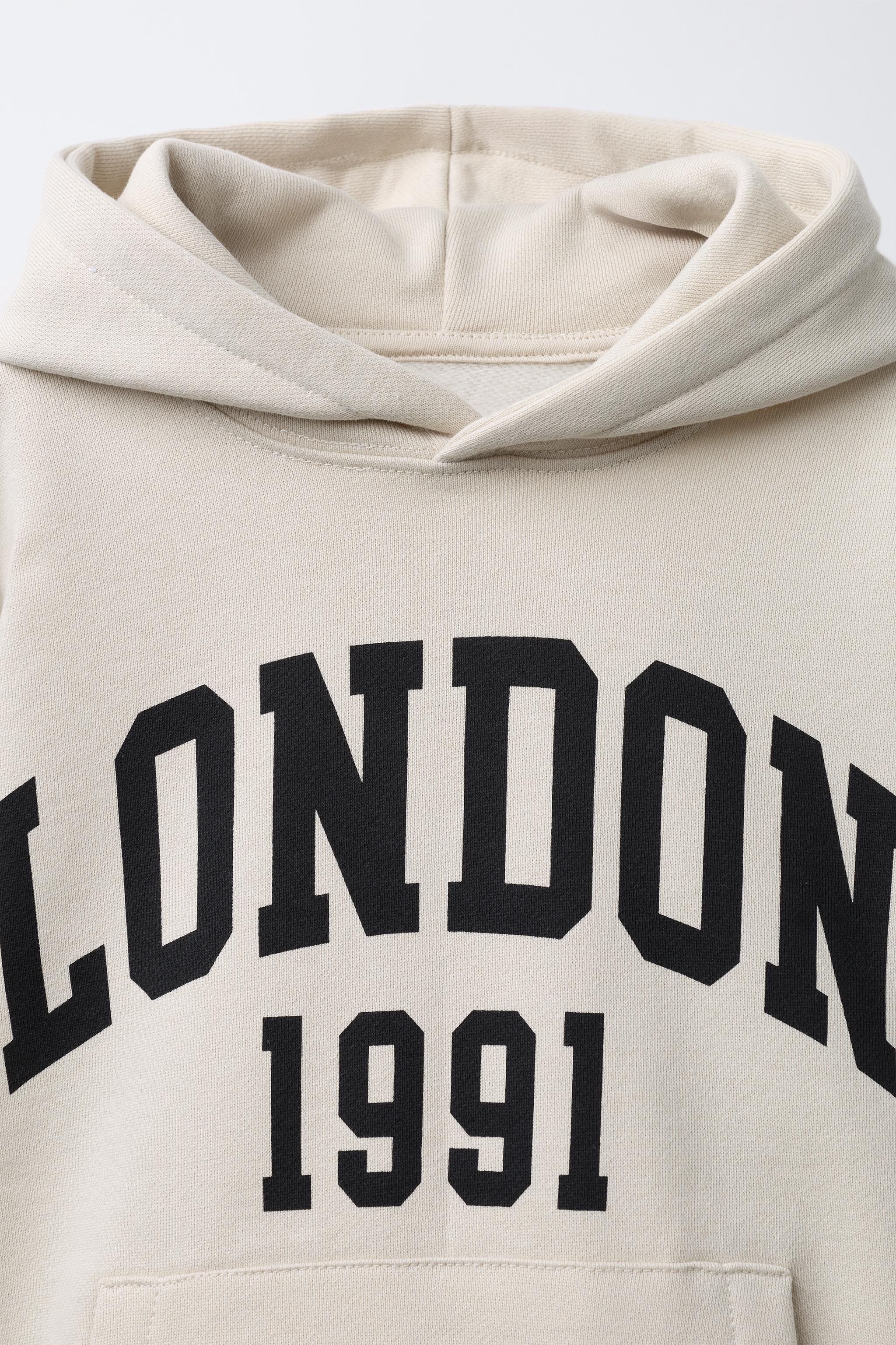 VARSITY HOODED SWEATSHIRT
