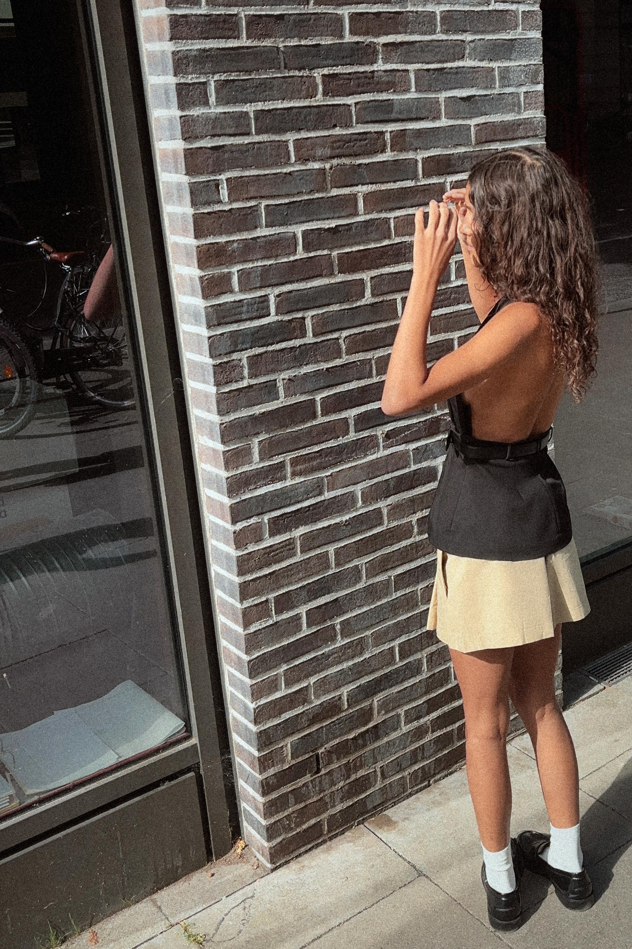 PLEATED SHORTS WITH BUTTONS