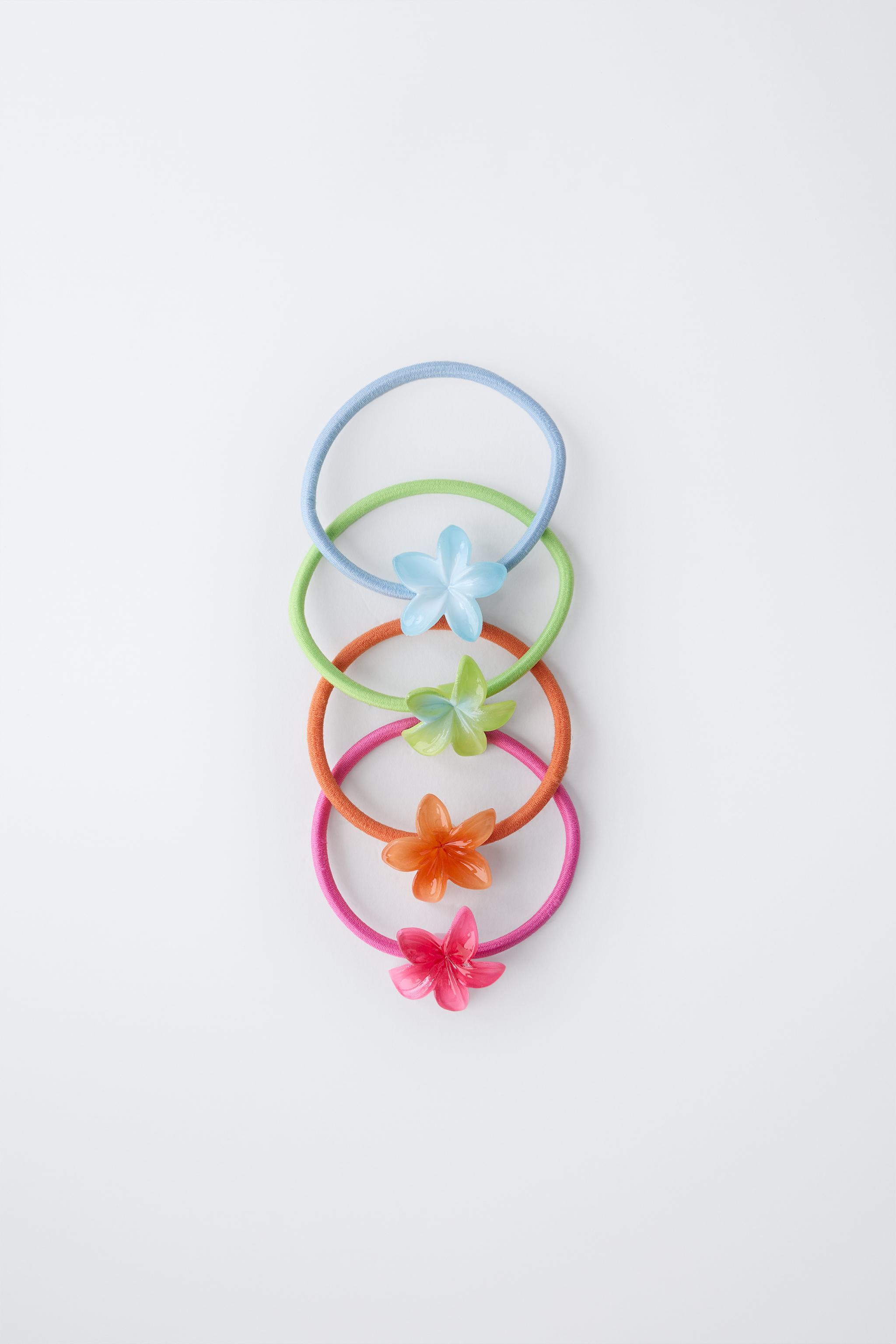 FOUR-PACK OF FLOWER HAIR TIES