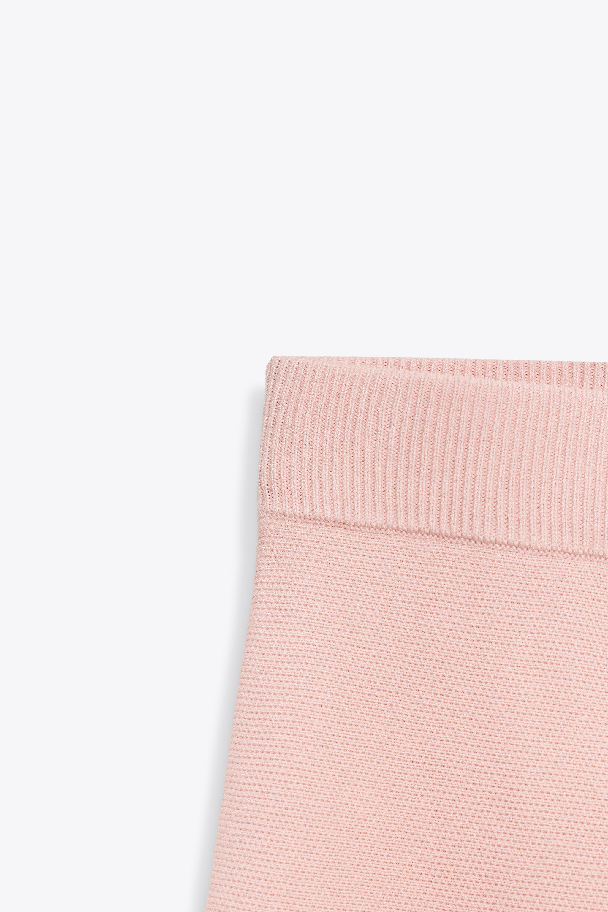 BOX PLEAT KNIT MINI SKIRT