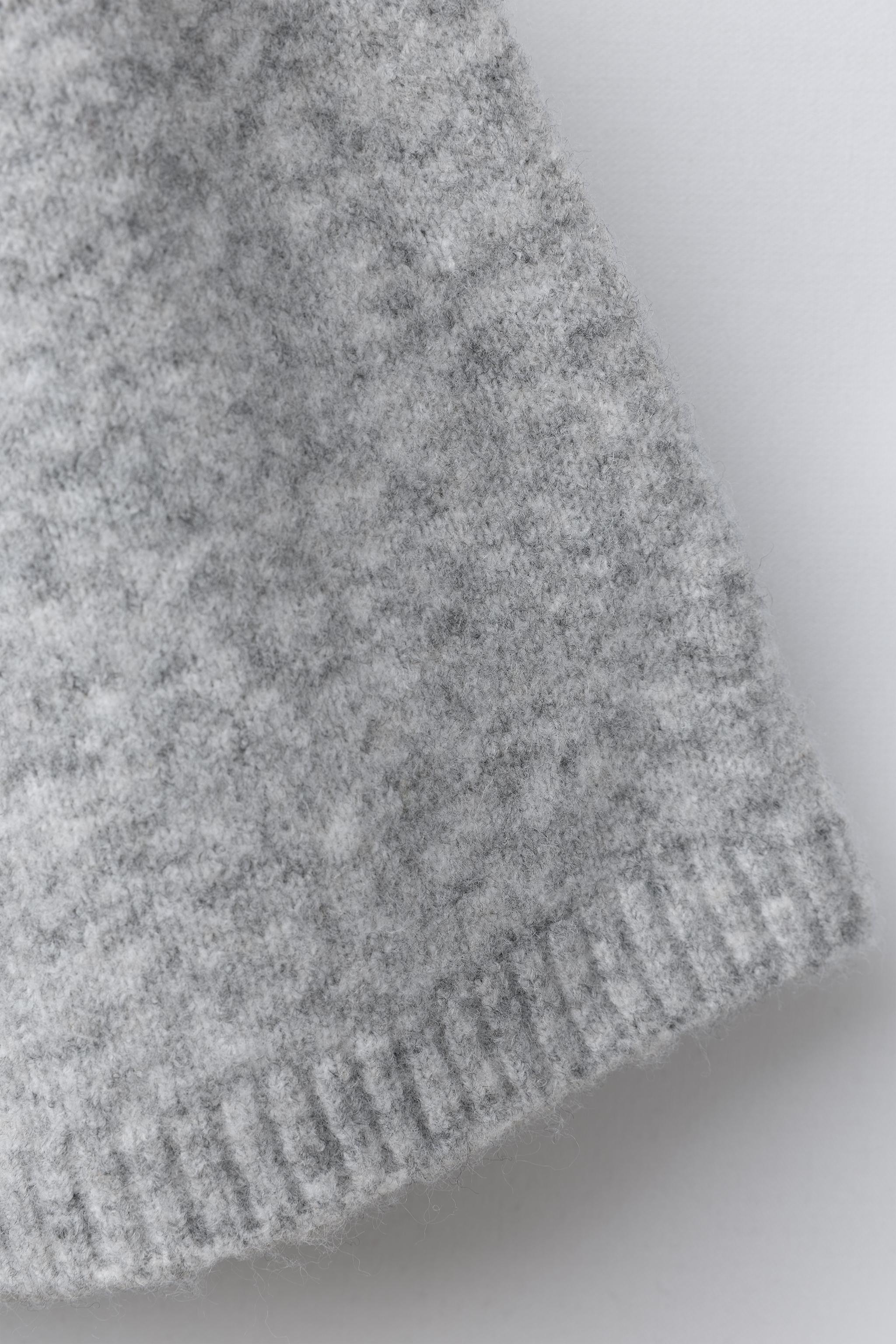 CAPE PONCHO WITH BOWS