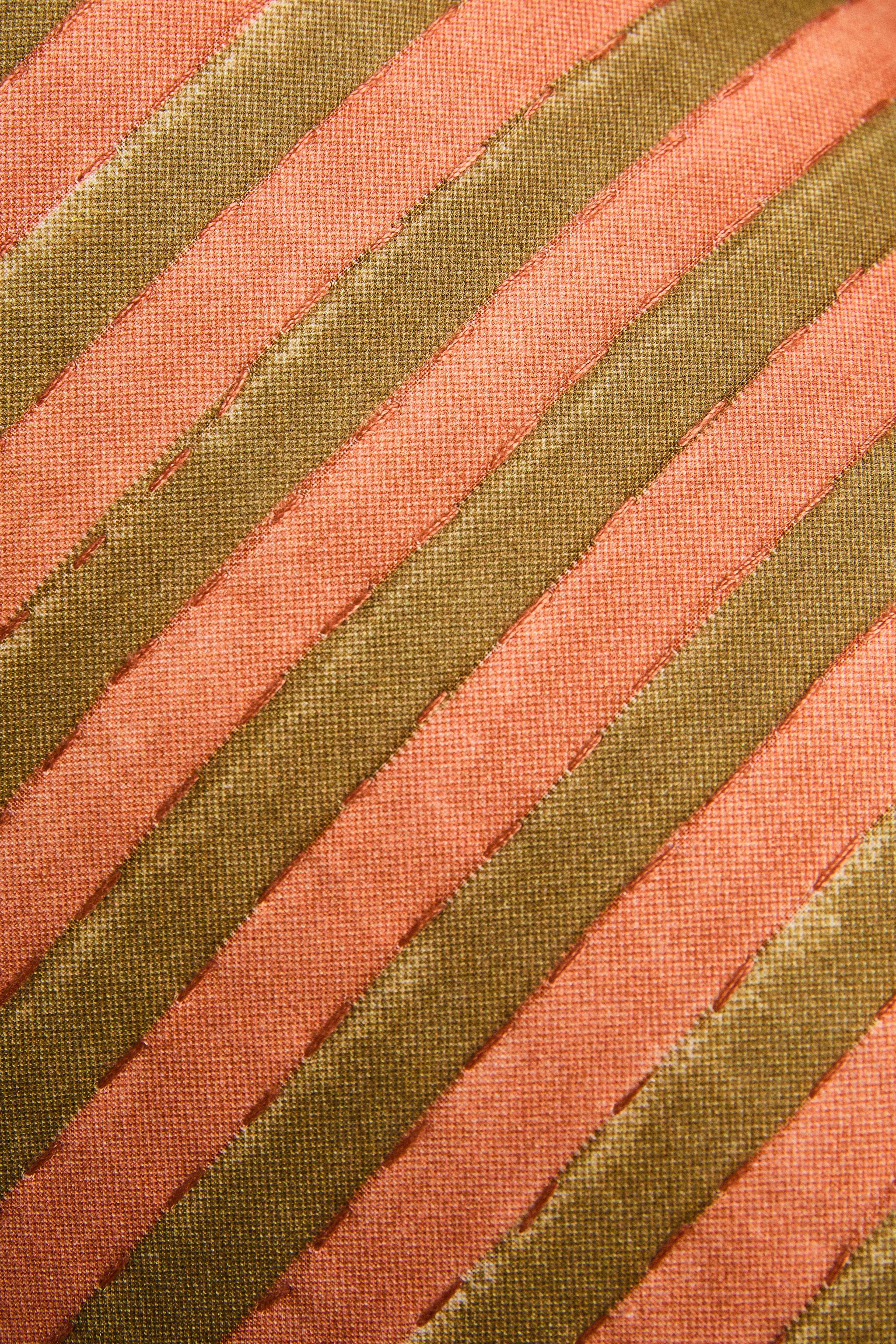 STRIPED CYLINDRICAL CUSHION
