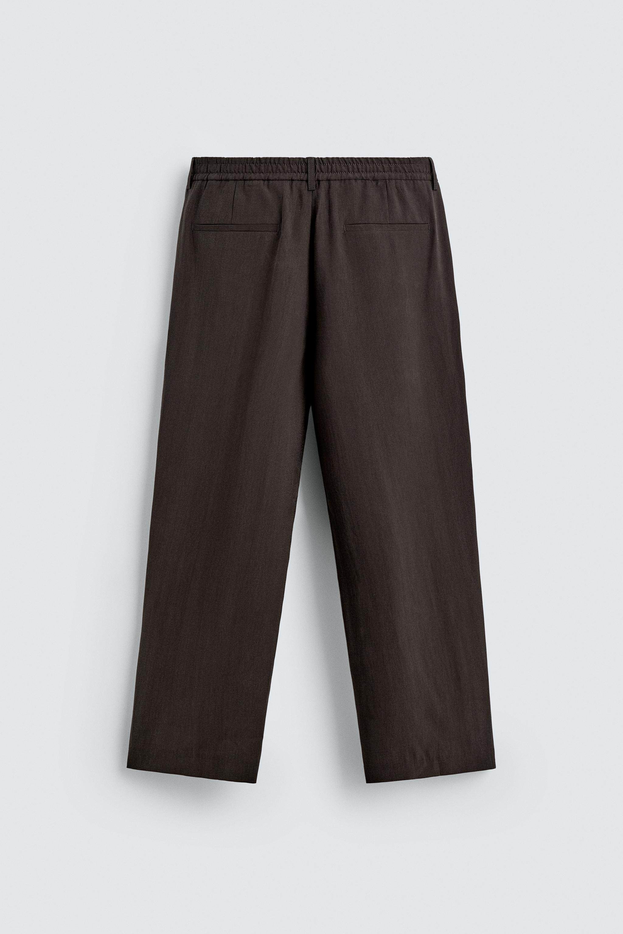 PLEATED FLOWY PANTS