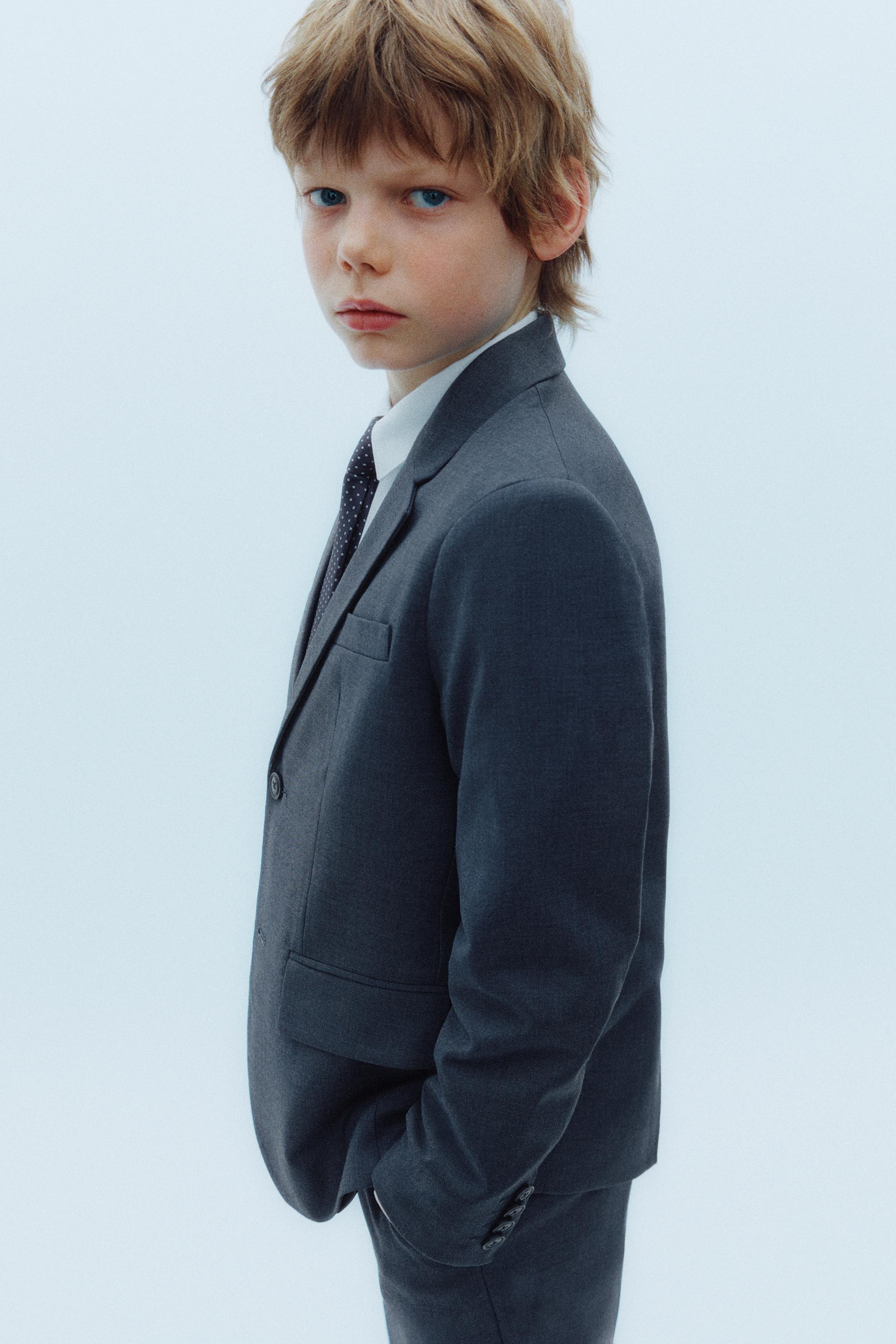 TEXTURED SUIT JACKET