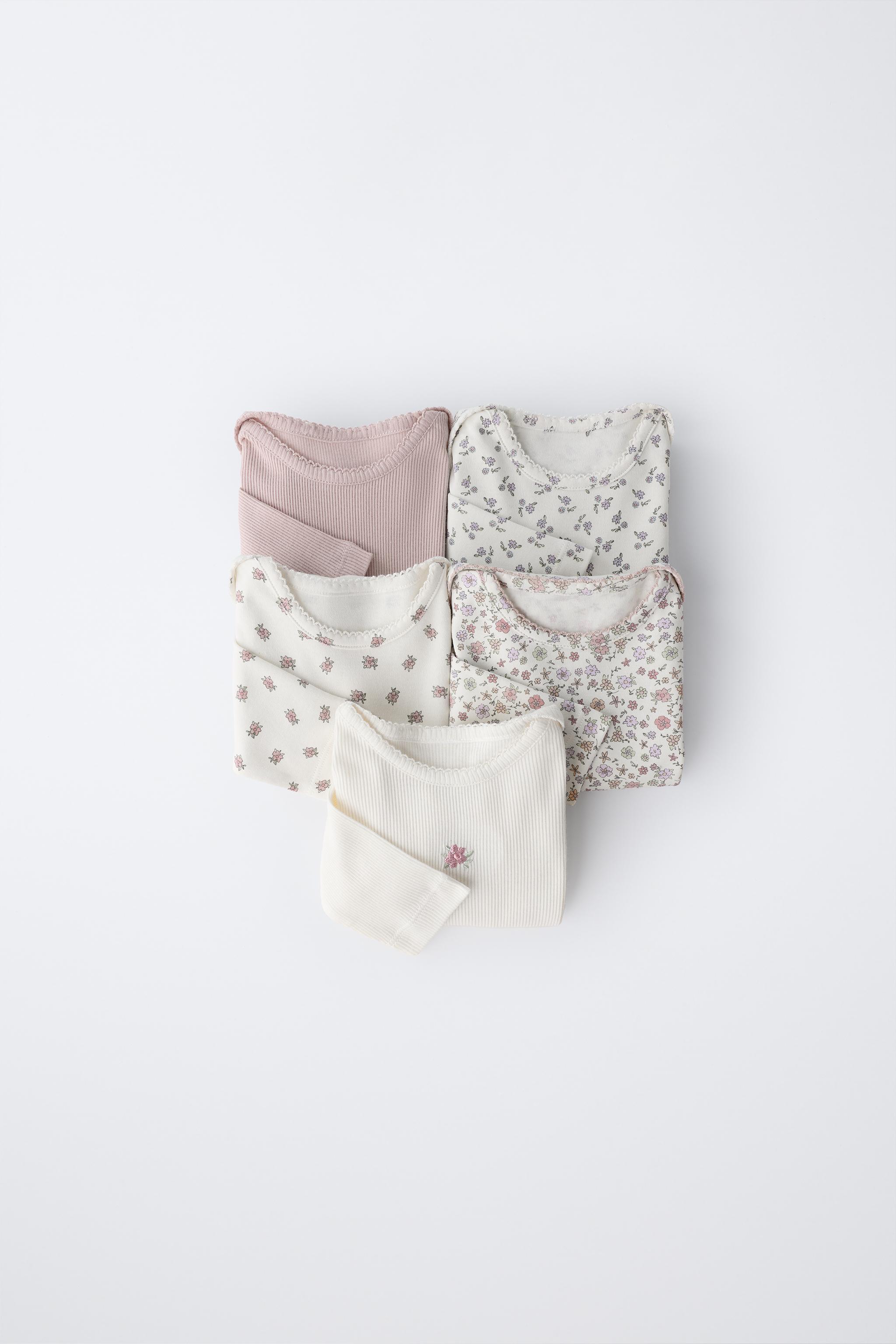 FIVE-PACK OF FLORAL BODYSUITS