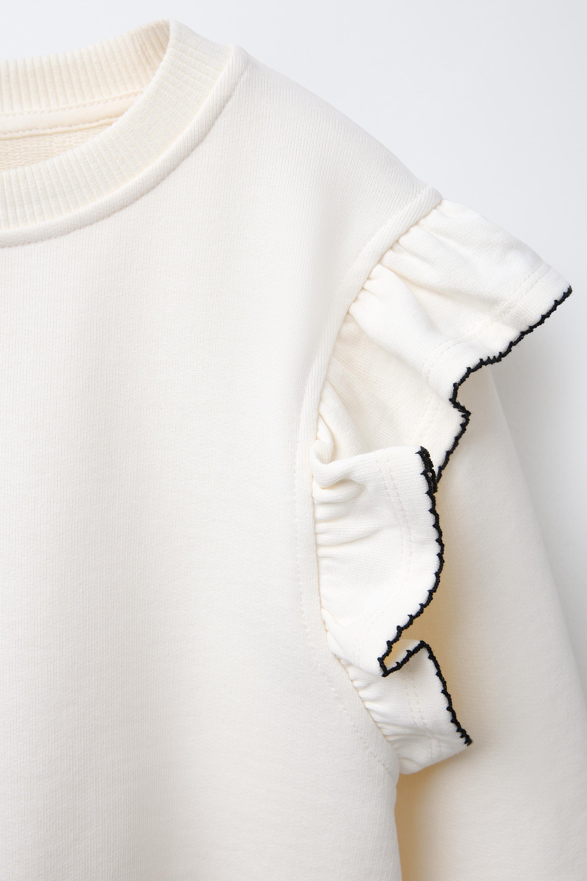 TOPSTITCHED RUFFLED SWEATSHIRT