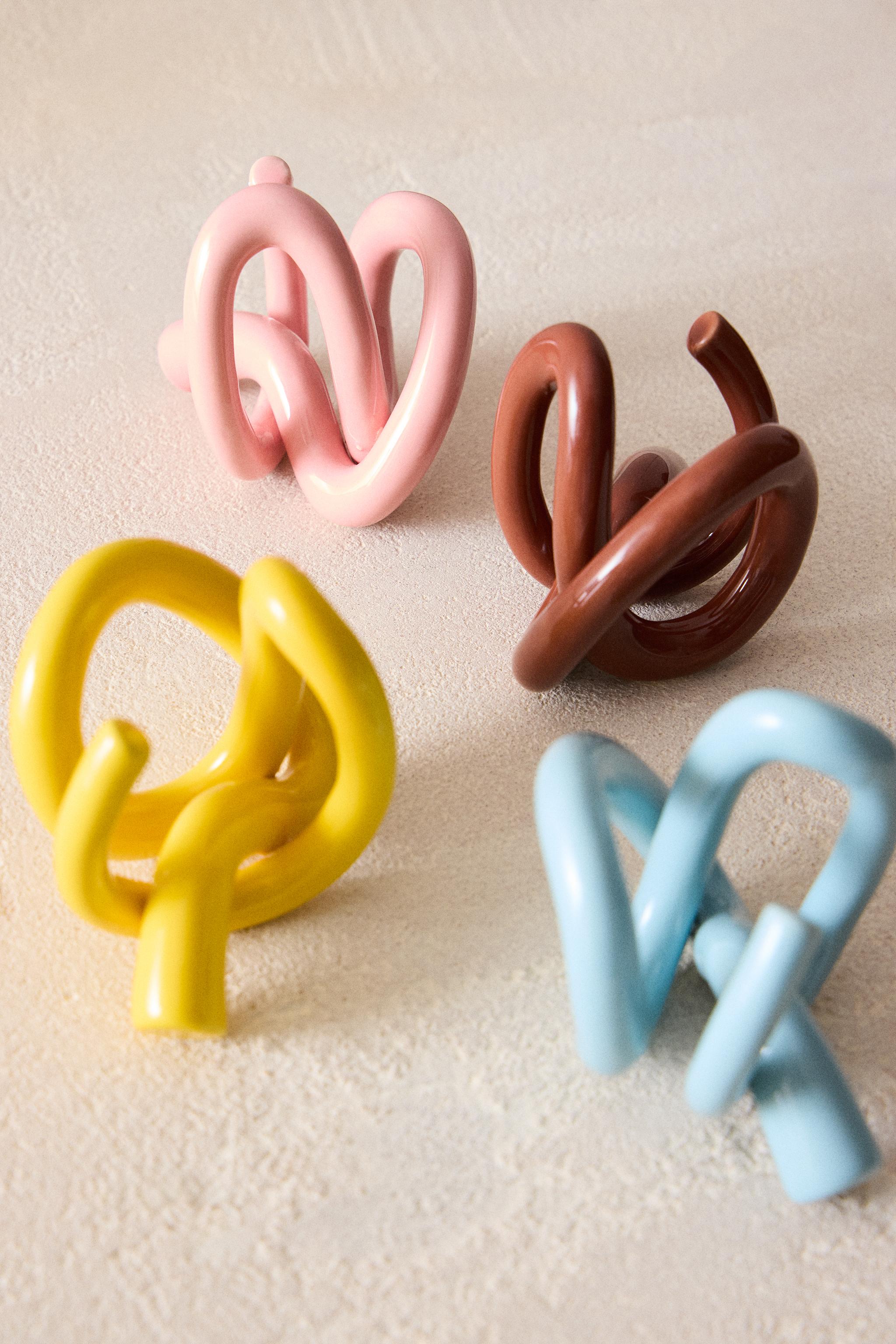 SET OF TEXTURED CERAMIC NAPKIN RINGS (SET OF 4) X COLLAGERIE