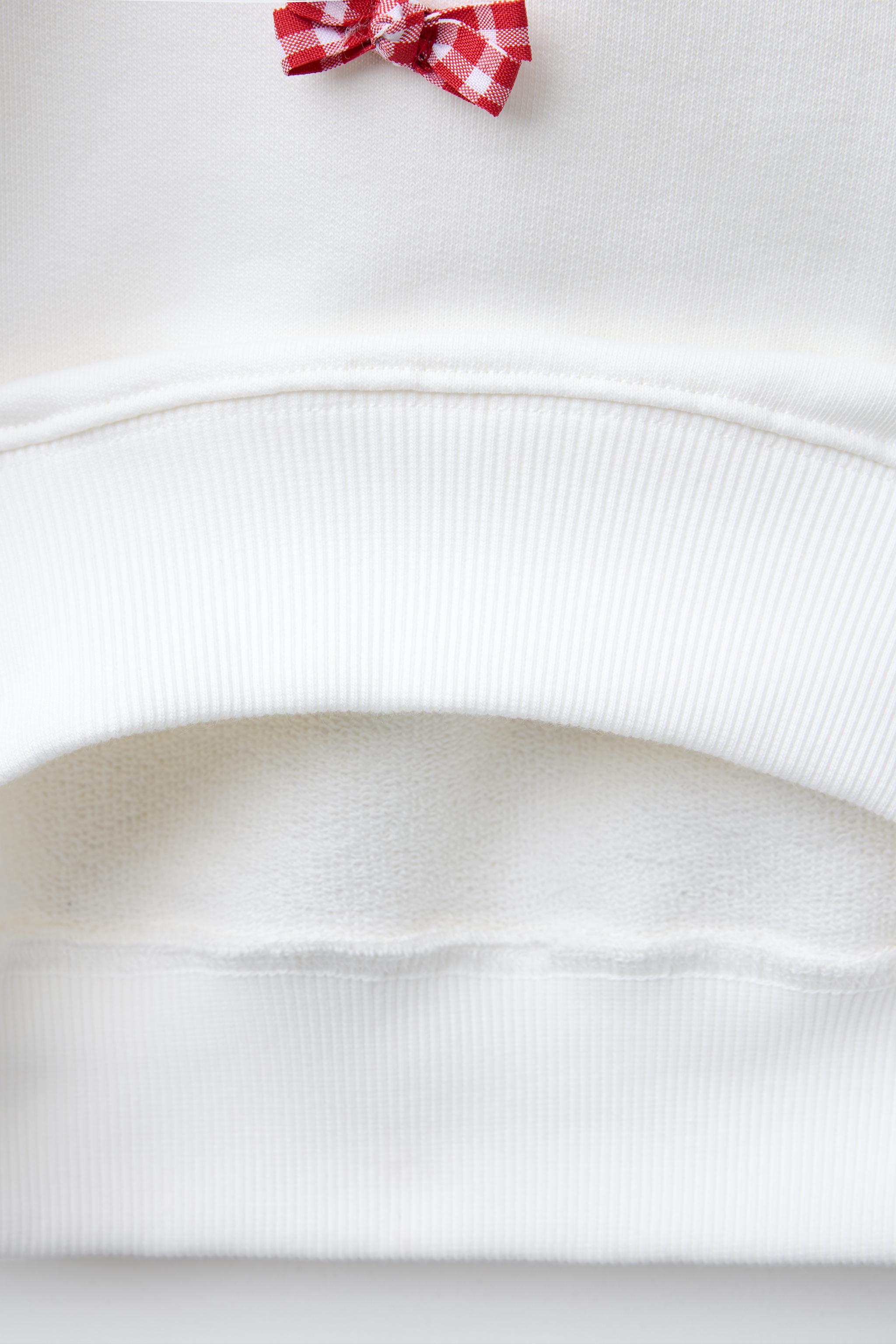 TEXT AND BOWS SWEATSHIRT