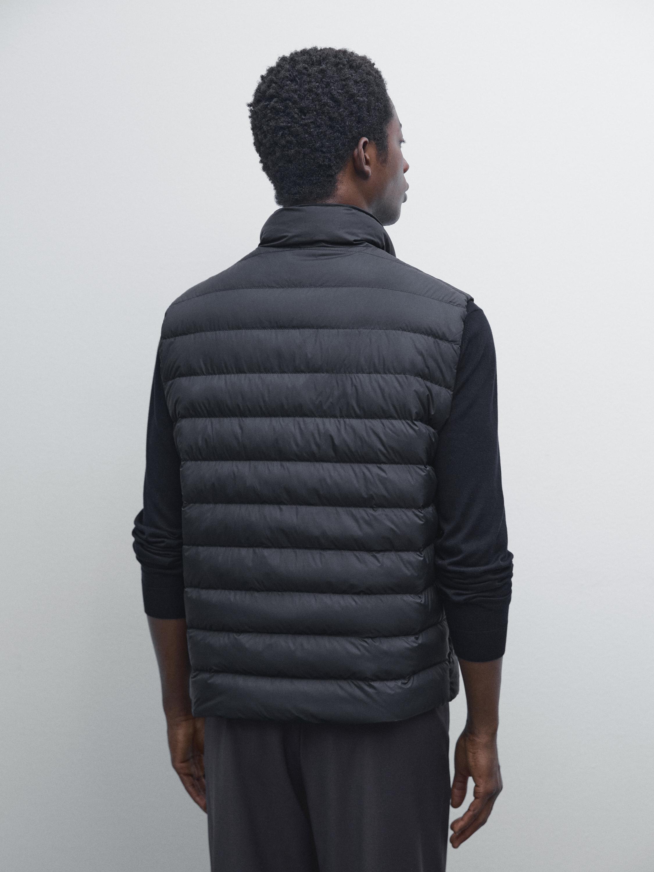 Water-repellent reversible down blend gilet