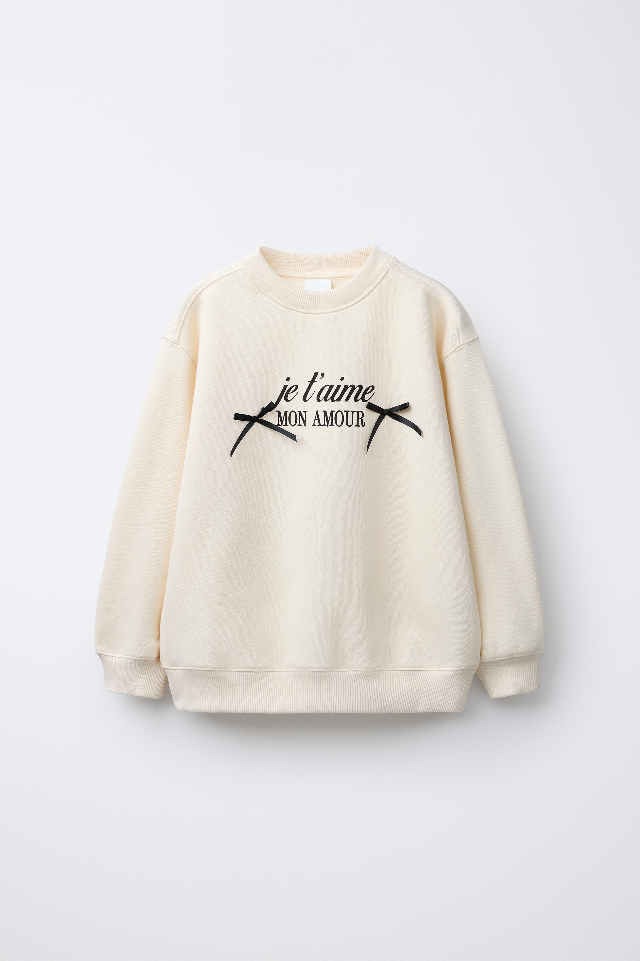 TEXT AND BOW PRINT SWEATSHIRT