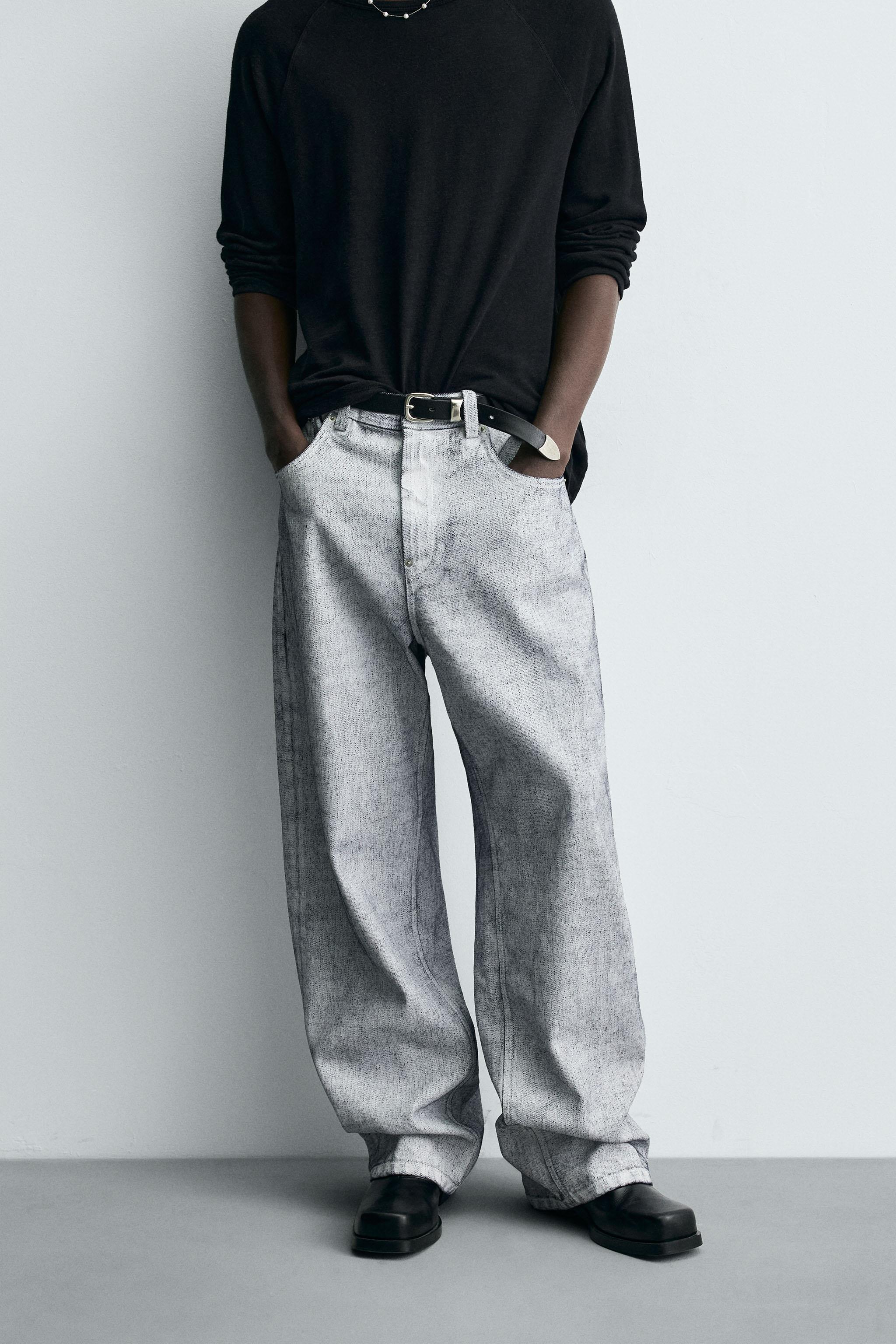 WAXED FINISH BAGGY FIT JEANS