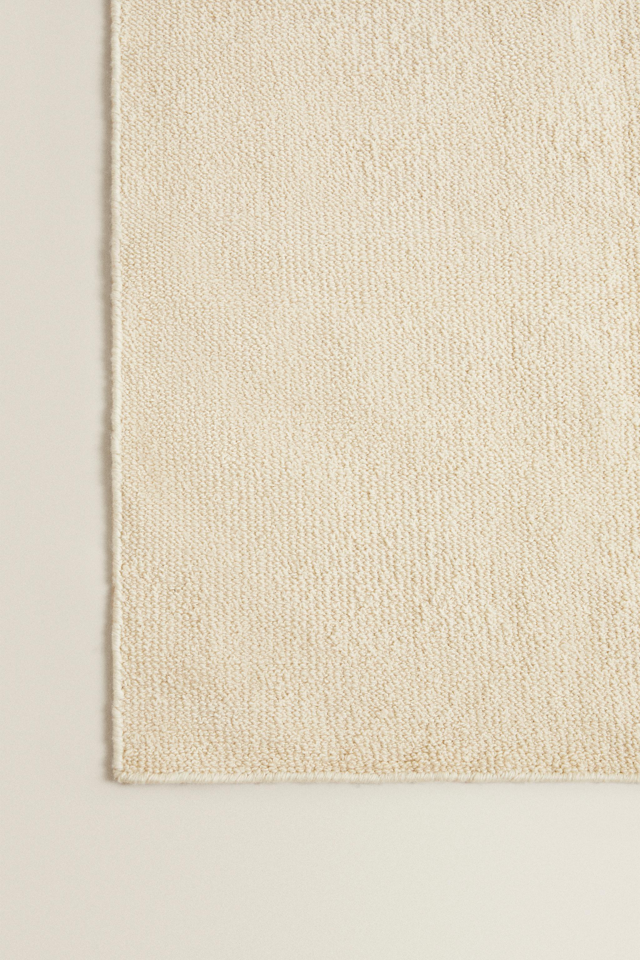 WAVY DETAIL WOOL AREA RUG