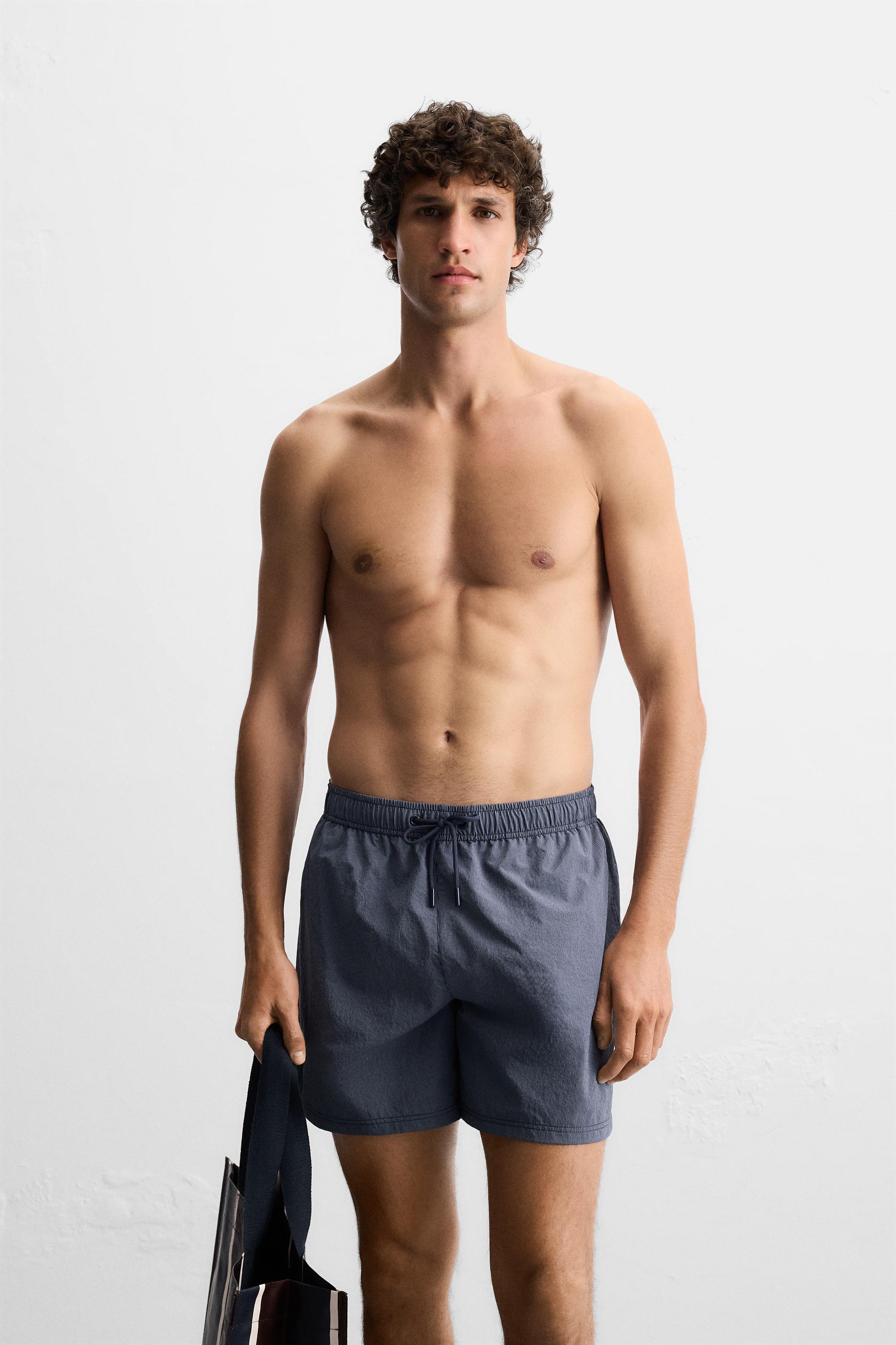 STRIPED MID-LENGTH SWIMSUIT