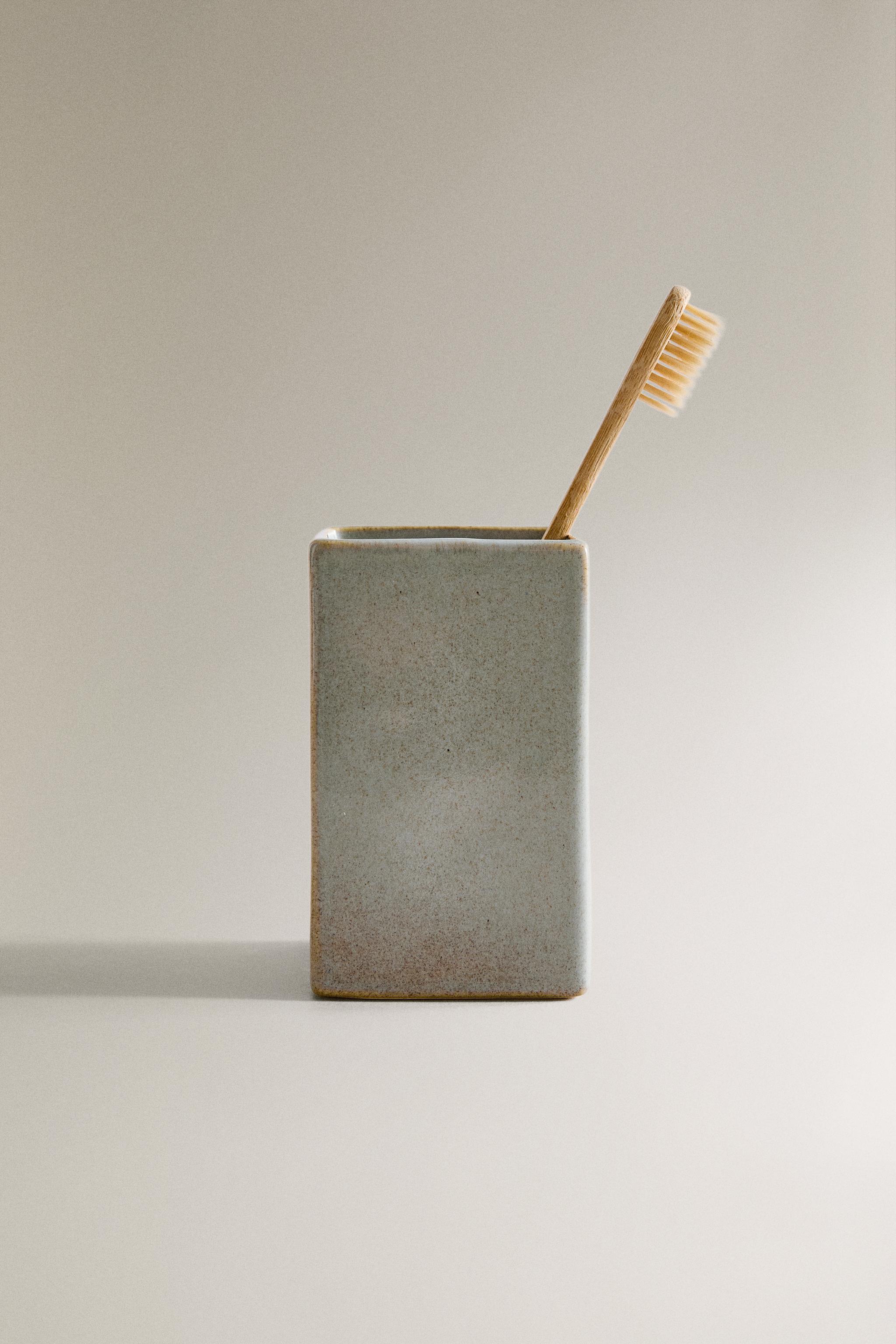 GREENISH TOOTHBRUSH HOLDER