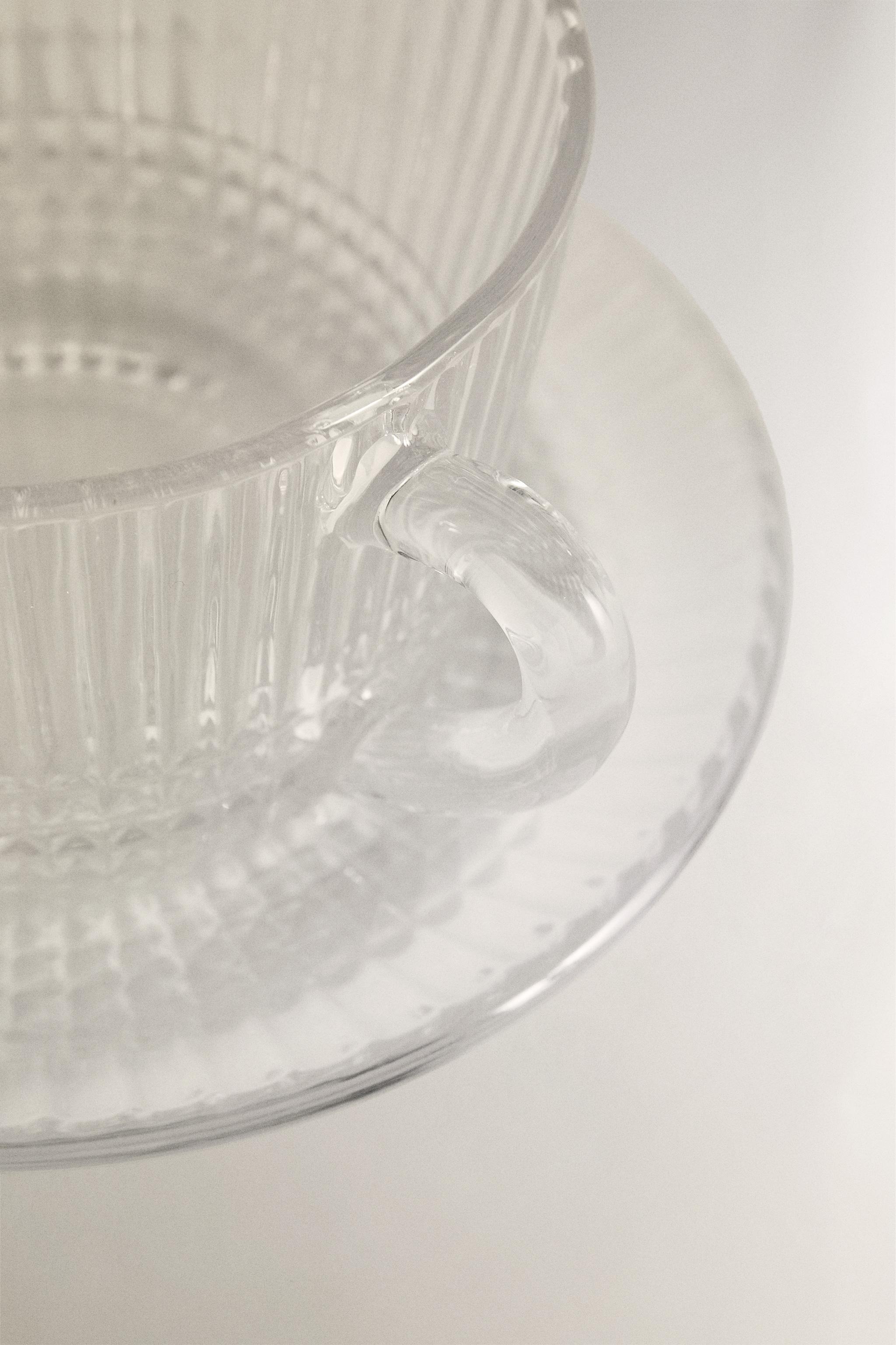 GLASS TEACUP WITH RAISED GEOMETRIC DESIGN