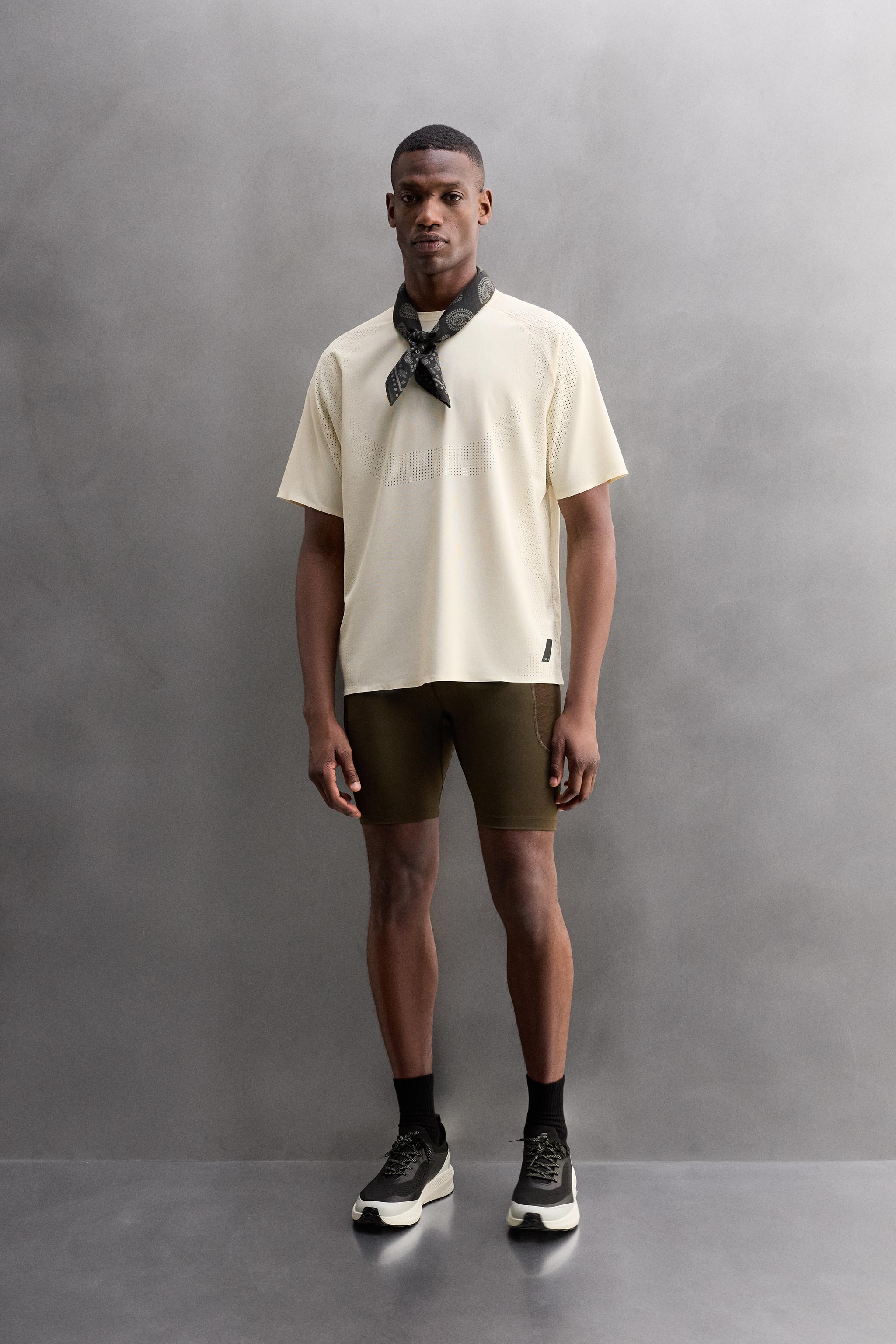 OPEN KNIT STRUCTURE T-SHIRT