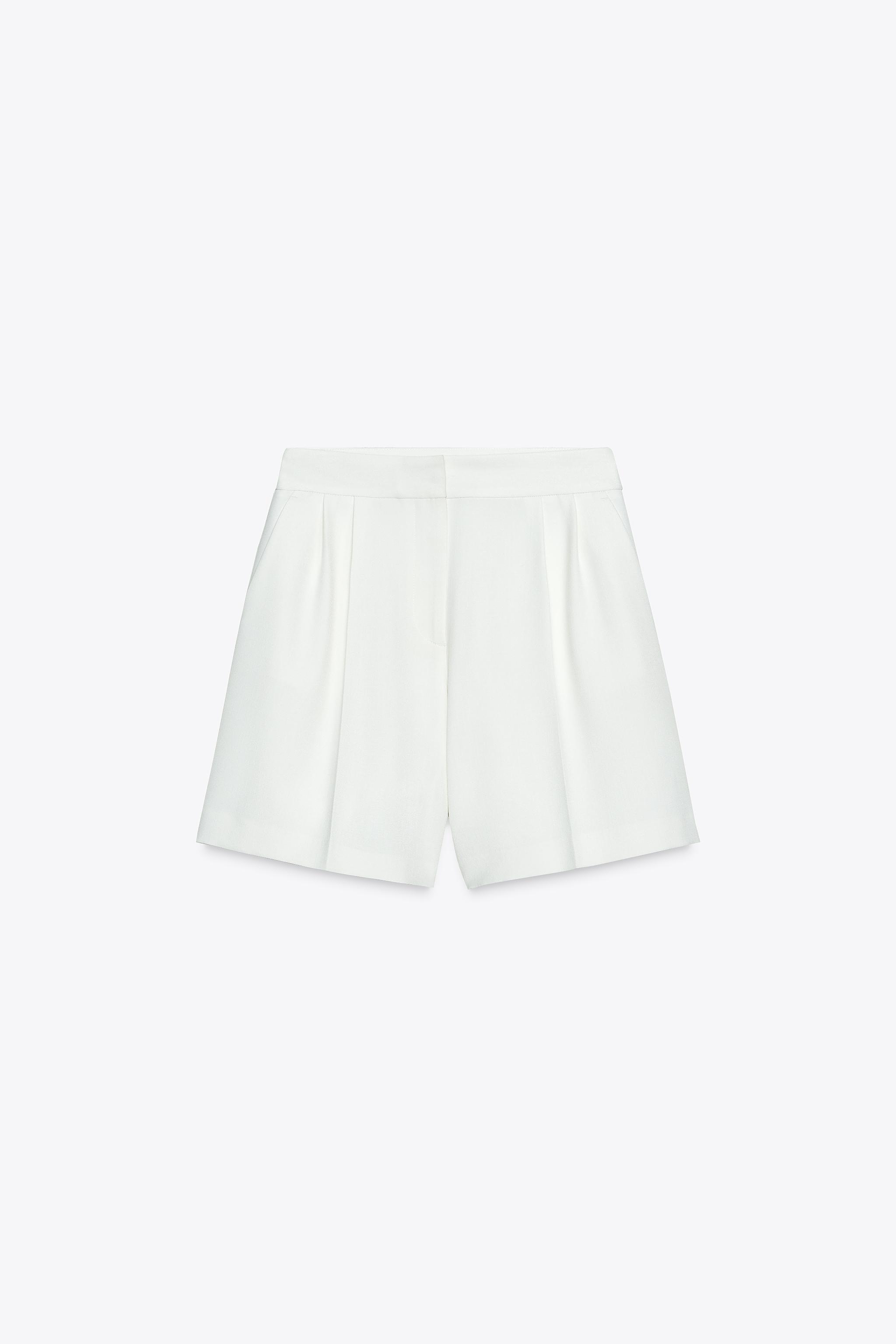HIGH-WAISTED PLEATED SHORTS