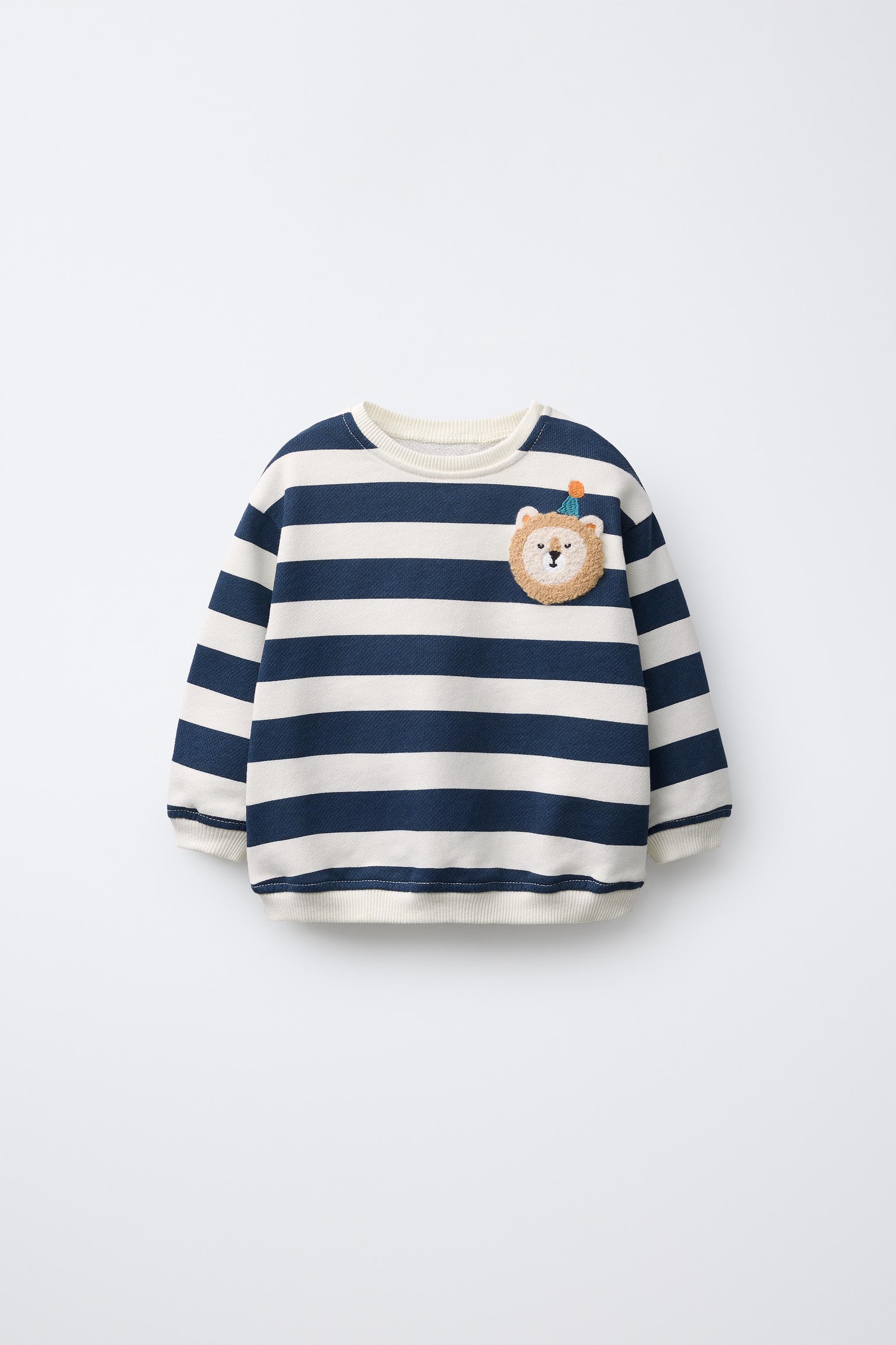 STRIPED SWEATSHIRT WITH LION PATCH