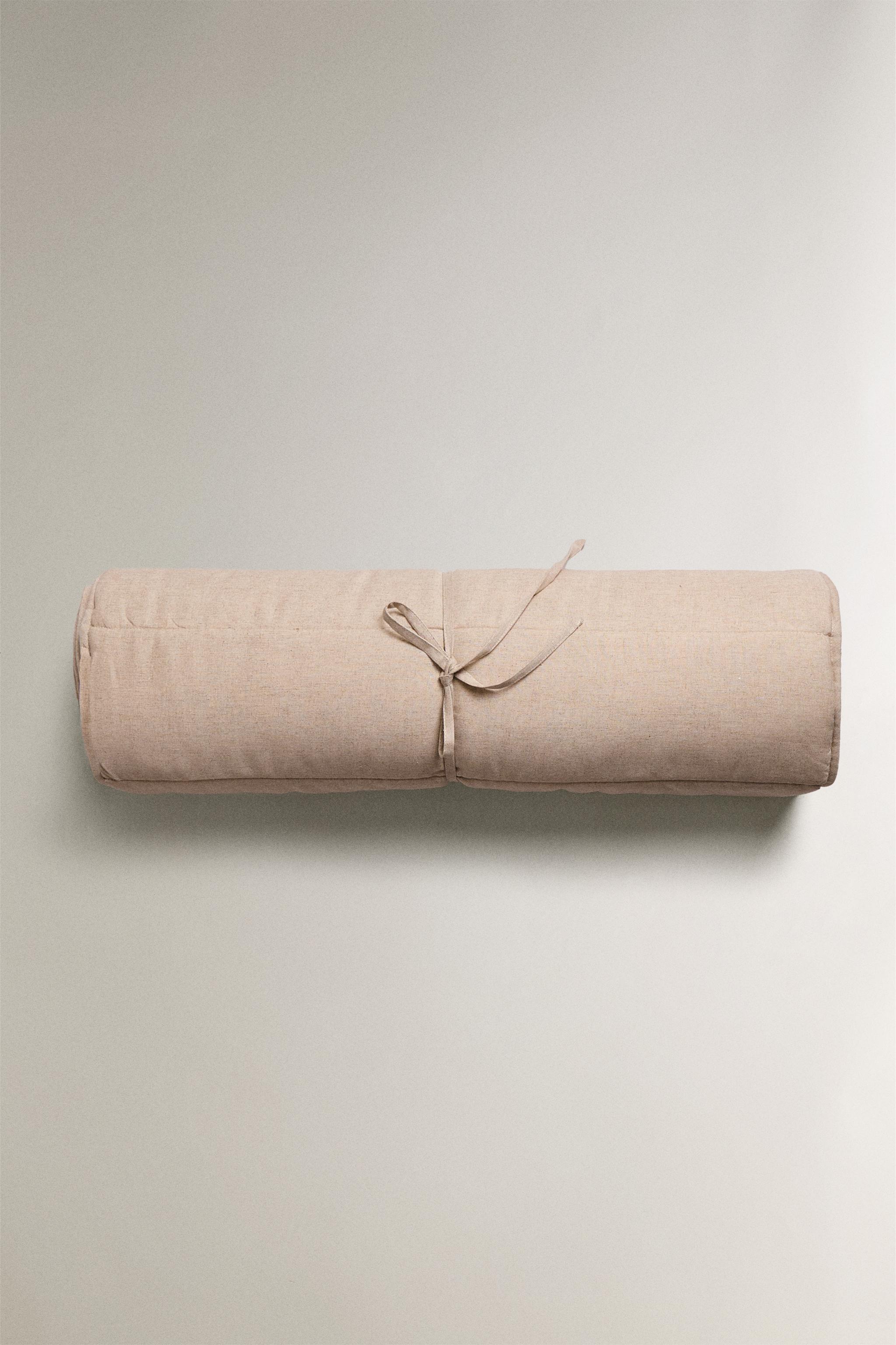 QUILTED TOPPER MADE OF TOWEL FABRIC