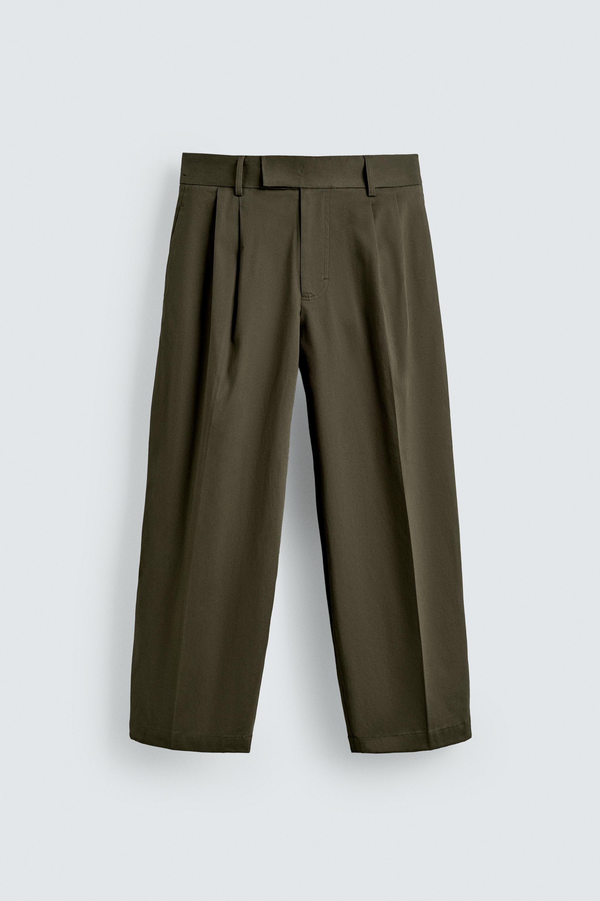 RELAXED FIT PLEATED PANTS